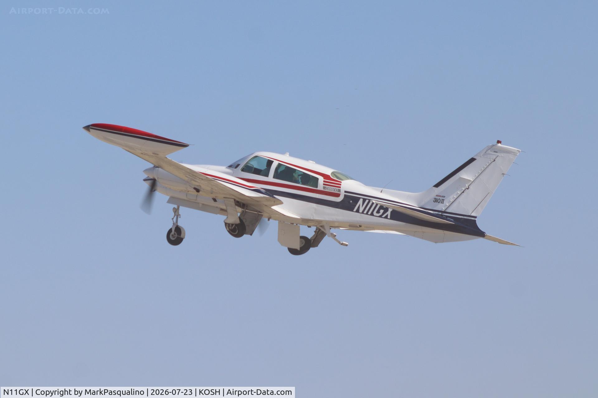 Aircraft N11GX, 1976 Cessna 310R, c/n 310R0645, Cessna 310R, at KOSH, photo by MarkPasqualino