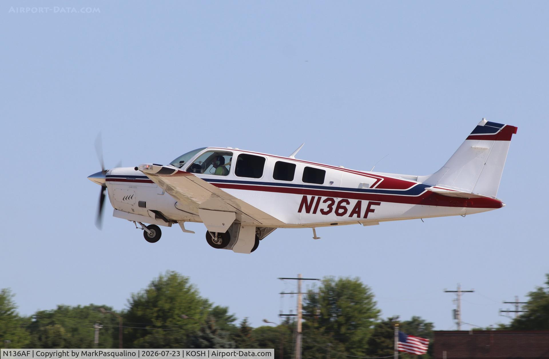 Aircraft N136AF, 1981 Beech A36 Bonanza 36, c/n E1861, Beech A36, at KOSH, photo by MarkPasqualino