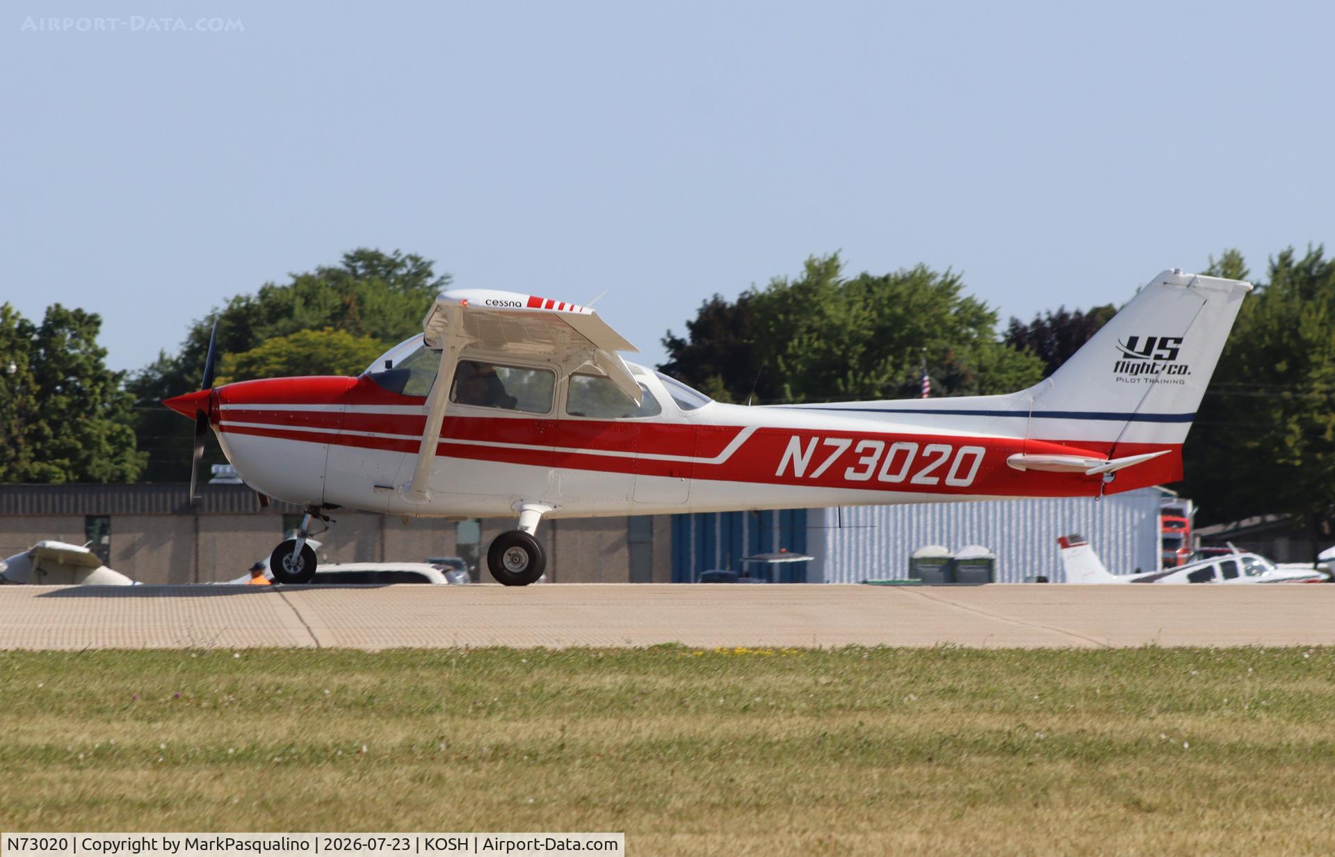 Aircraft N73020, 1976 Cessna 172M, c/n 17267239, Cessna 172M, at KOSH, photo by MarkPasqualino