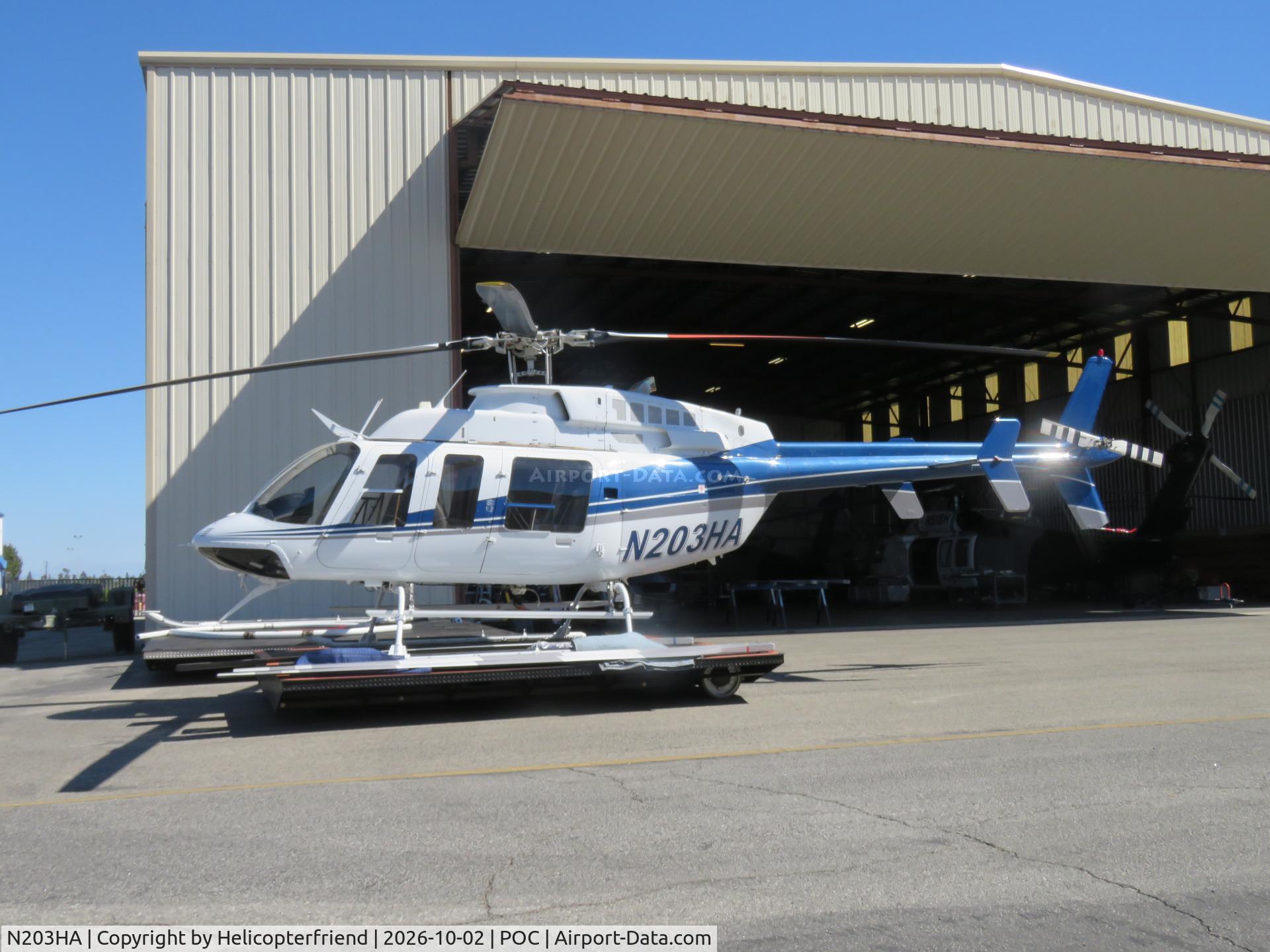 Aircraft N203HA, 1996 Bell 407, c/n 53023, Sitting on her dolly, at POC, photo by Helicopterfriend