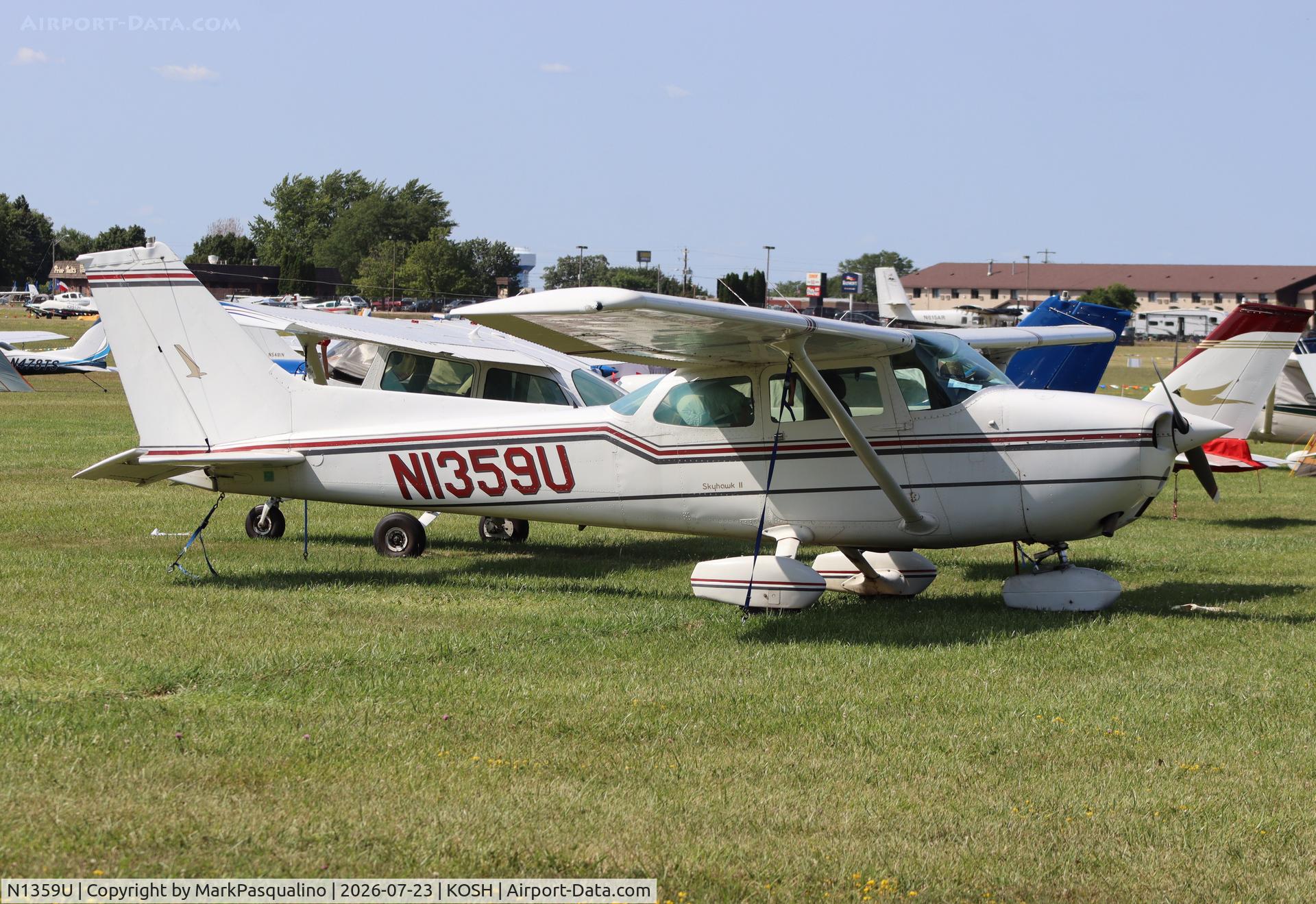 Aircraft N1359U, 1976 Cessna 172M, c/n 17267030, Cessna 172M, at KOSH, photo by MarkPasqualino