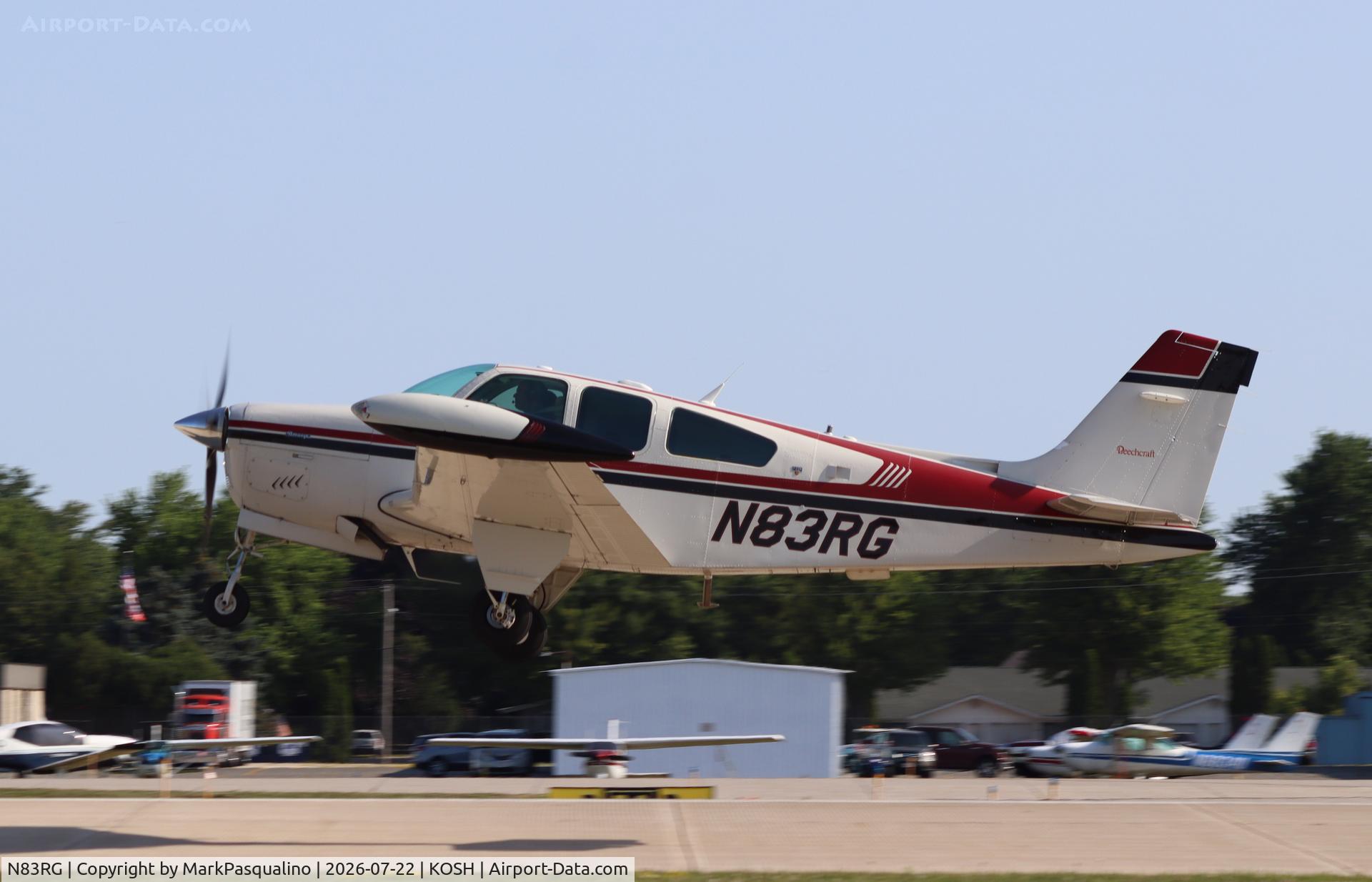 Aircraft N83RG, 1987 Beech F33A Bonanza, c/n CE-1205, Beech F33A, at KOSH, photo by MarkPasqualino