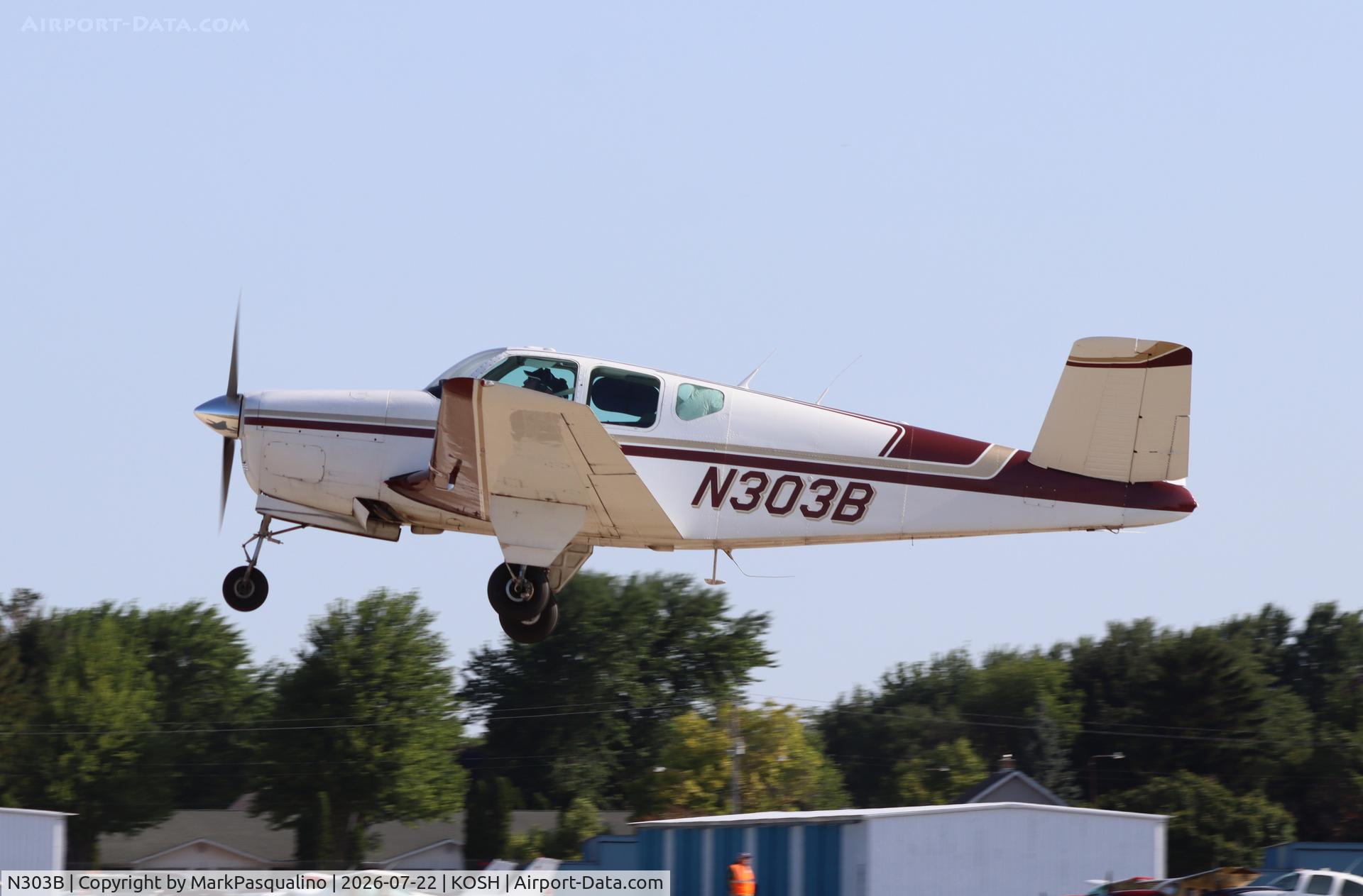 Aircraft N303B, 1956 Beech G35 Bonanza, c/n D-4707, Beech G35, at KOSH, photo by MarkPasqualino