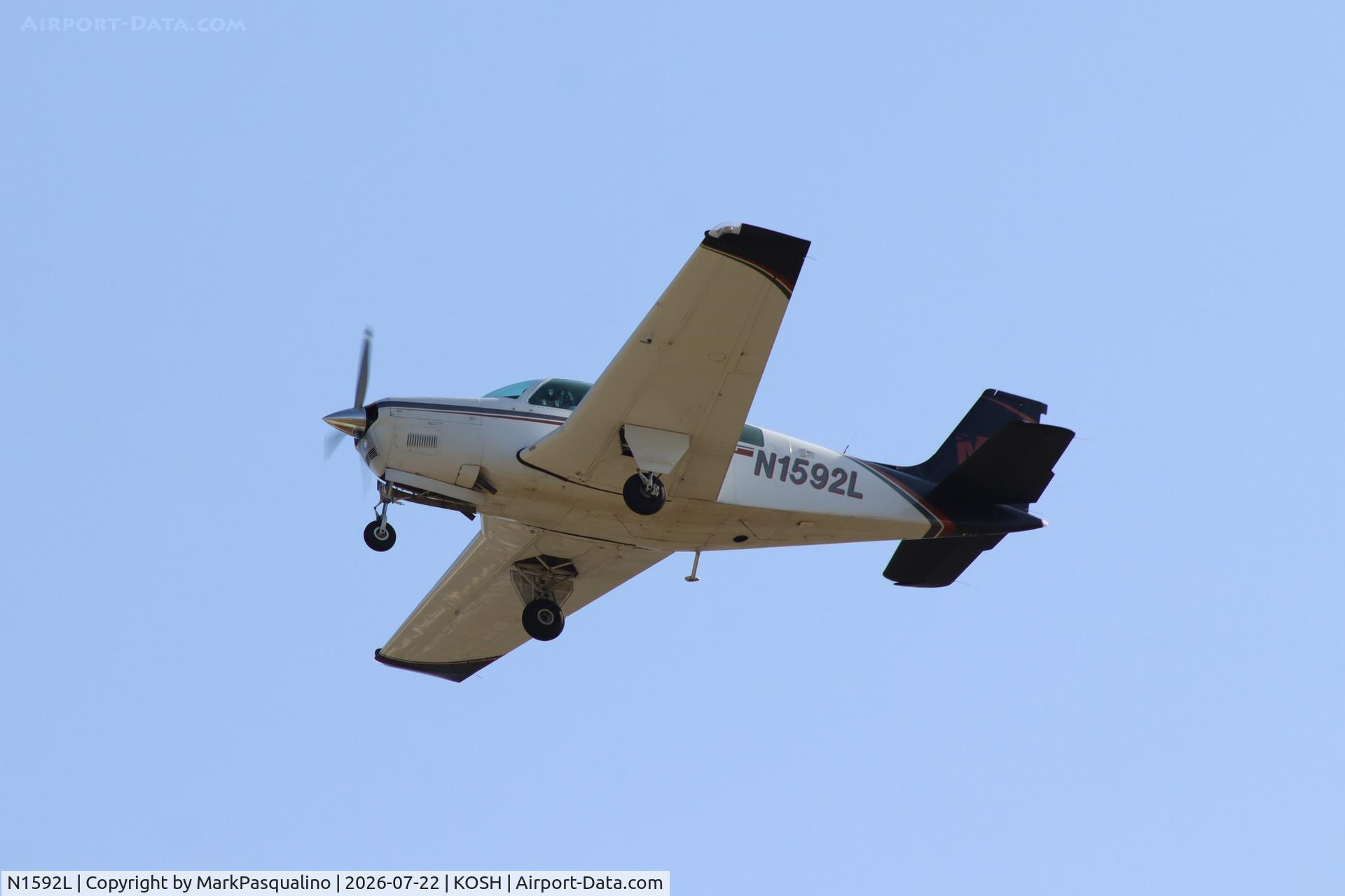 Aircraft N1592L, 1976 Beech A36 Bonanza 36, c/n E-832, Beech A36, at KOSH, photo by MarkPasqualino