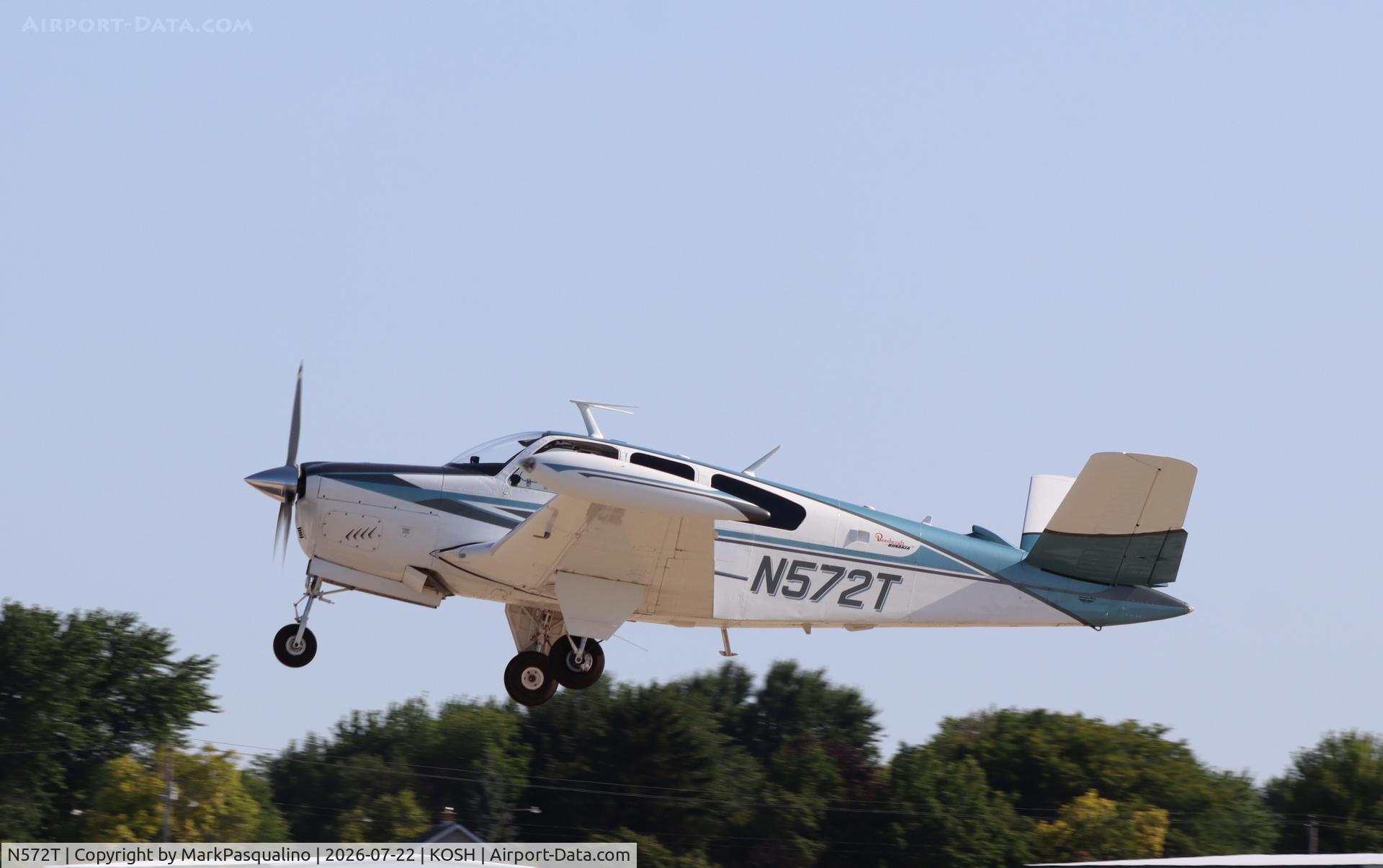 Aircraft N572T, 1964 Beech S35 Bonanza, c/n D-7400, Beech S35, at KOSH, photo by MarkPasqualino