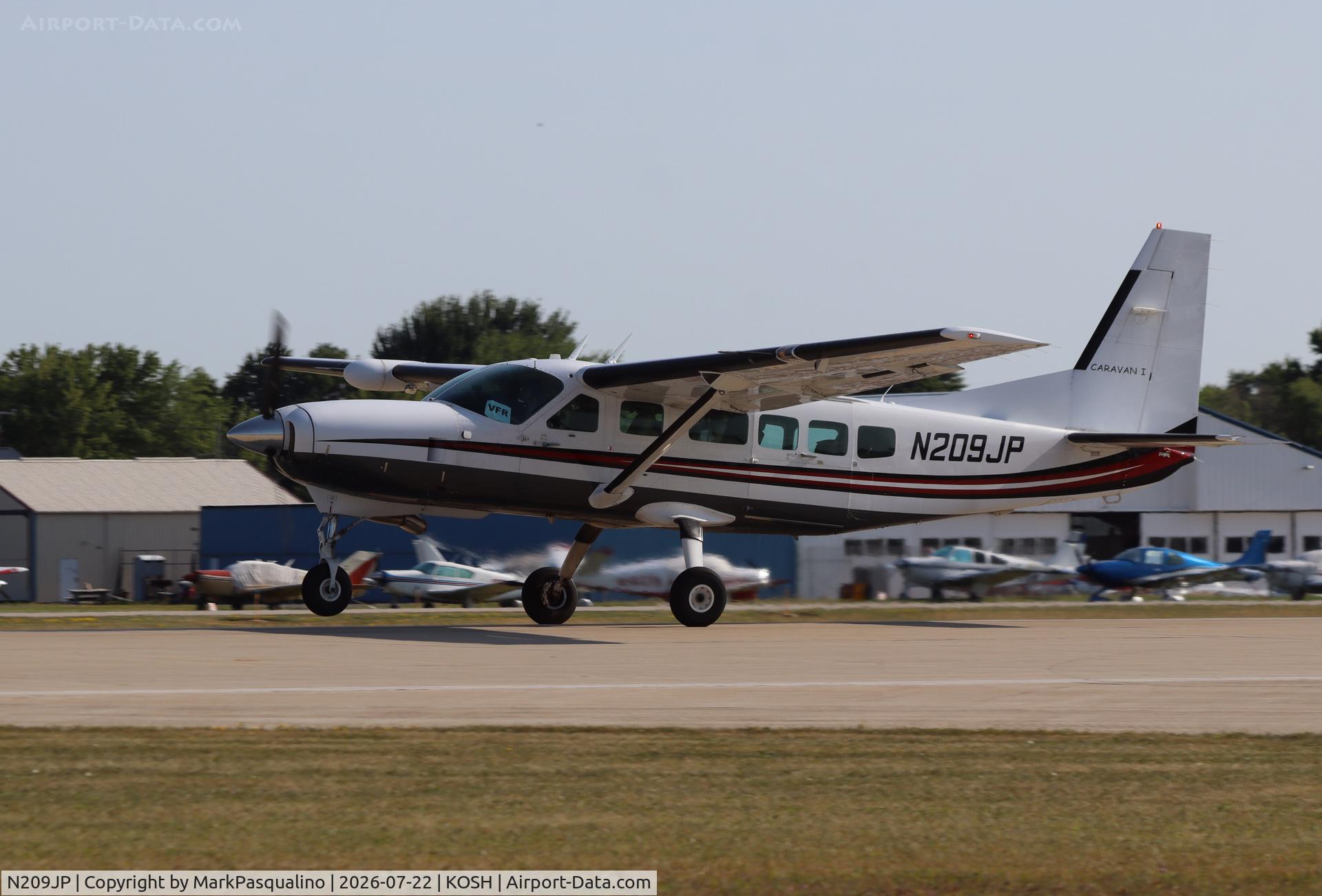Aircraft N209JP, 2007 Cessna 208 Caravan I, c/n 20800409, Cessna 208, at KOSH, photo by MarkPasqualino