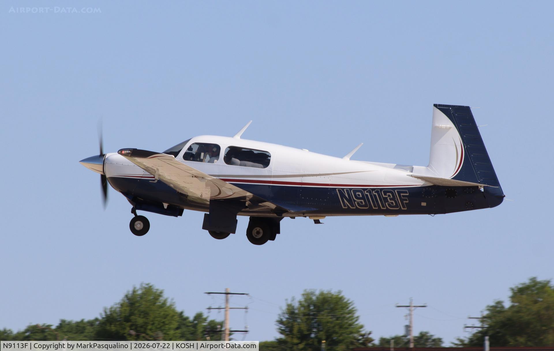 Aircraft N9113F, Mooney M20J 201, c/n 24-3180, Mooney M20J, at KOSH, photo by MarkPasqualino