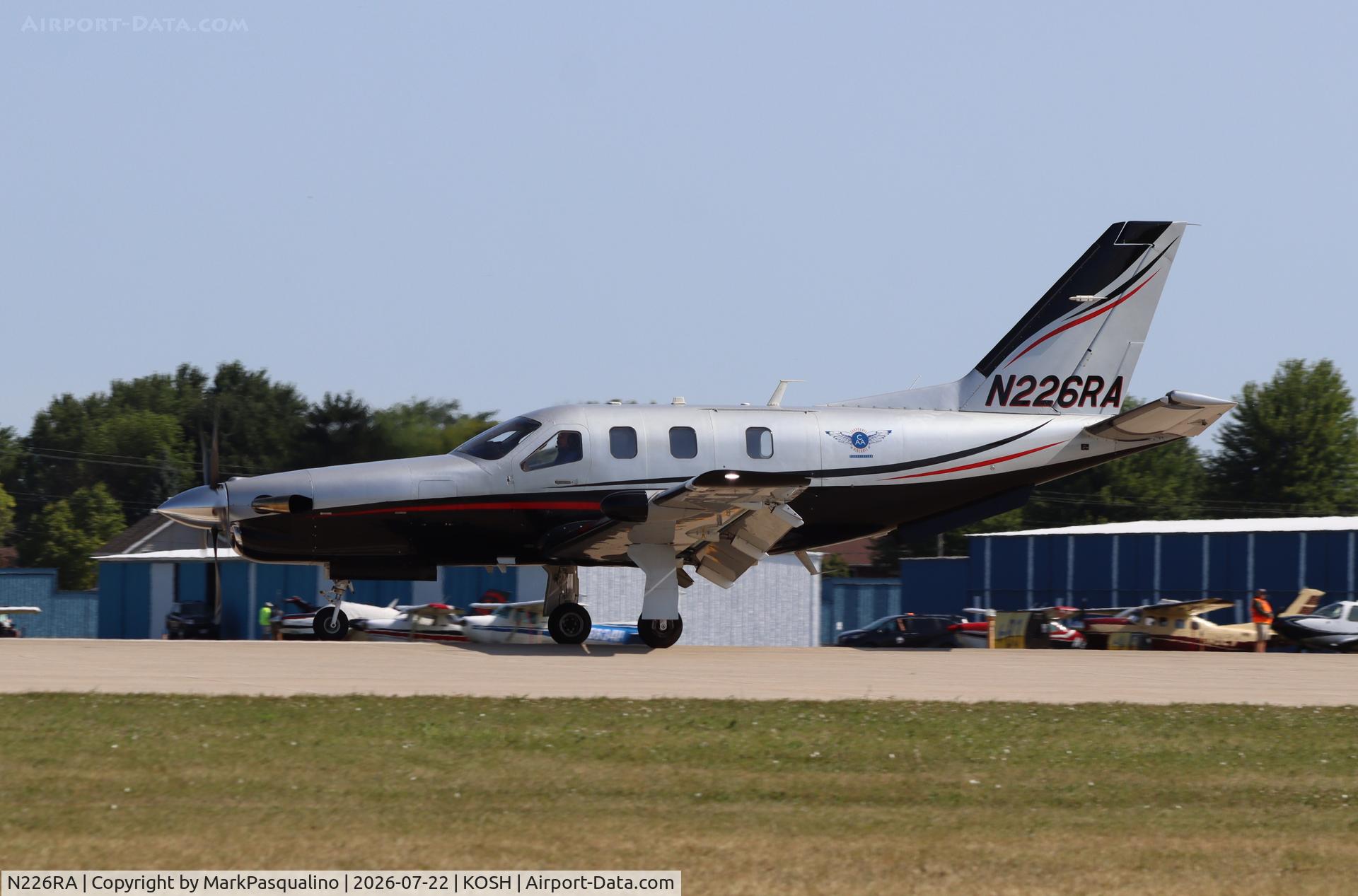 Aircraft N226RA, Socata TBM-700, c/n 482, Socata TBM-700, at KOSH, photo by MarkPasqualino
