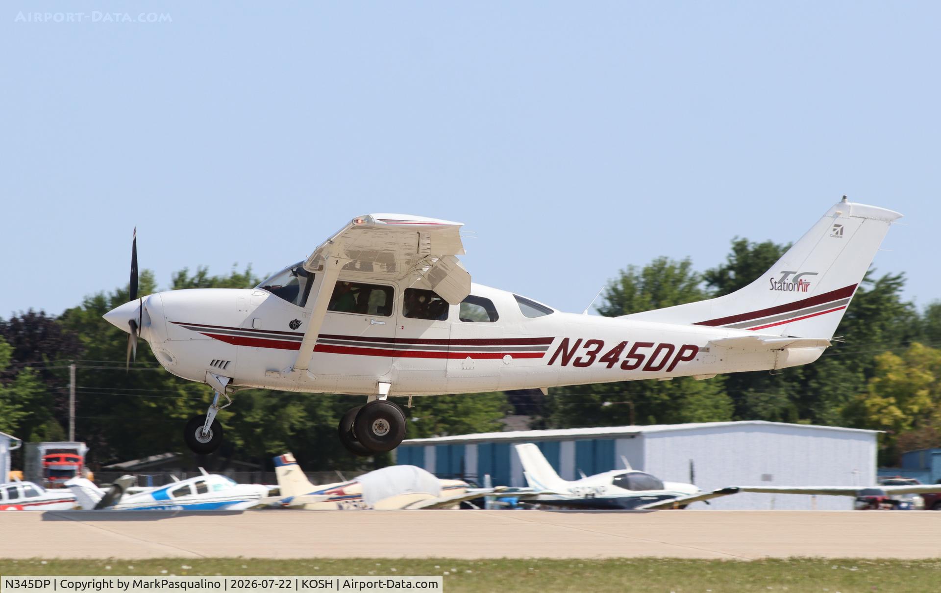 Aircraft N345DP, 2001 Cessna T206H Turbo Stationair, c/n T20608269, Cessna T206H, at KOSH, photo by MarkPasqualino