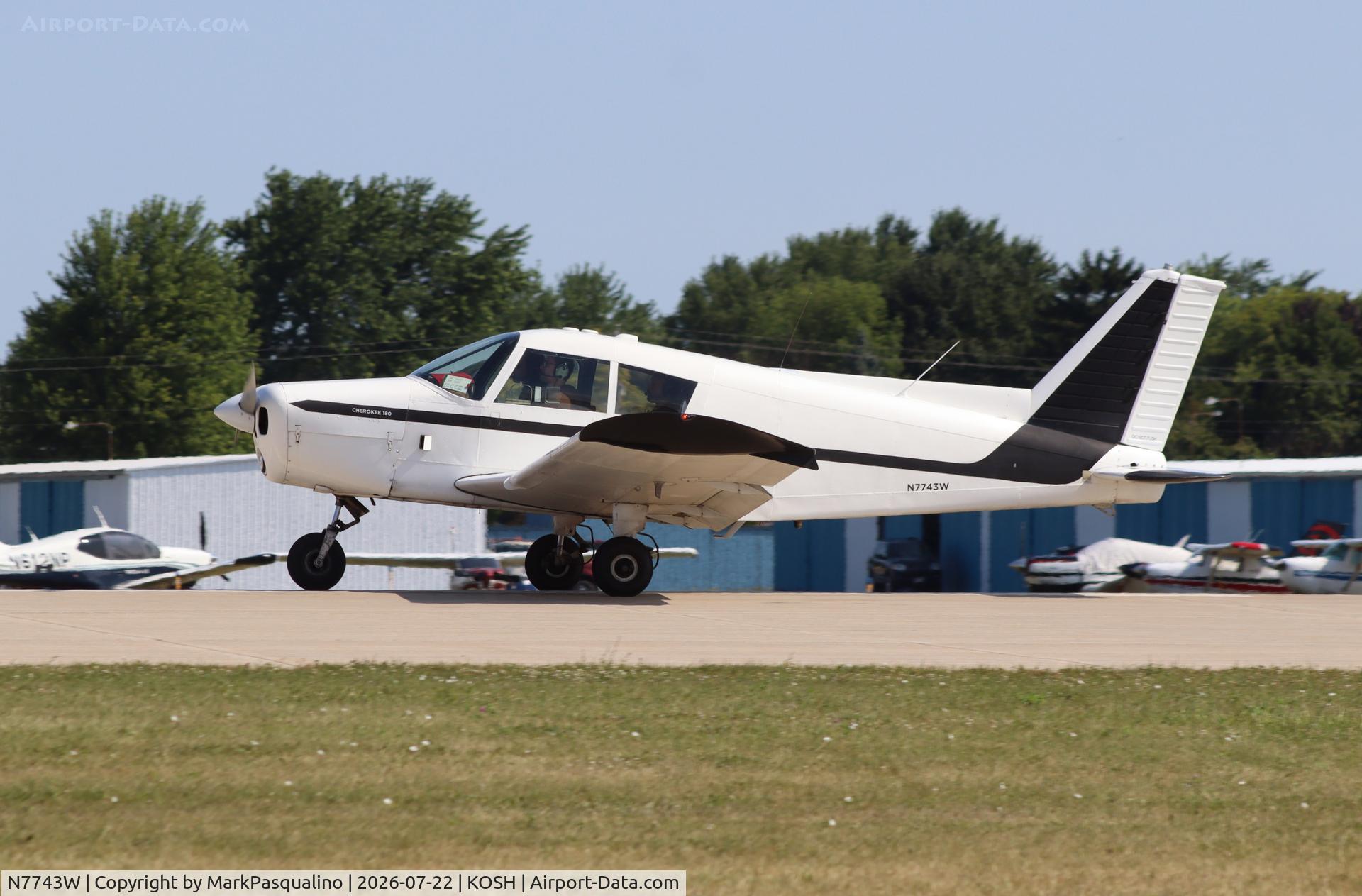 Aircraft N7743W, 1964 Piper PA-28-180, c/n 28-1752, Piper PA-28-180, at KOSH, photo by MarkPasqualino