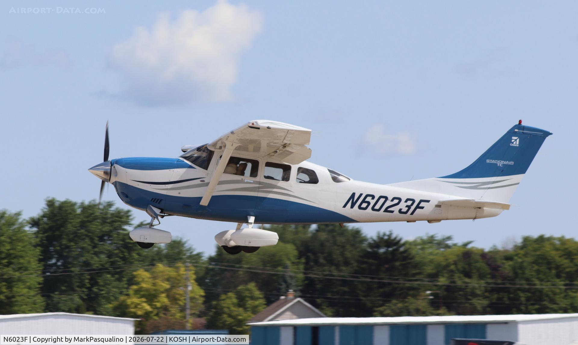 Aircraft N6023F, 2006 Cessna T206H Turbo Stationair, c/n T20608628, Cessna T206H, at KOSH, photo by MarkPasqualino