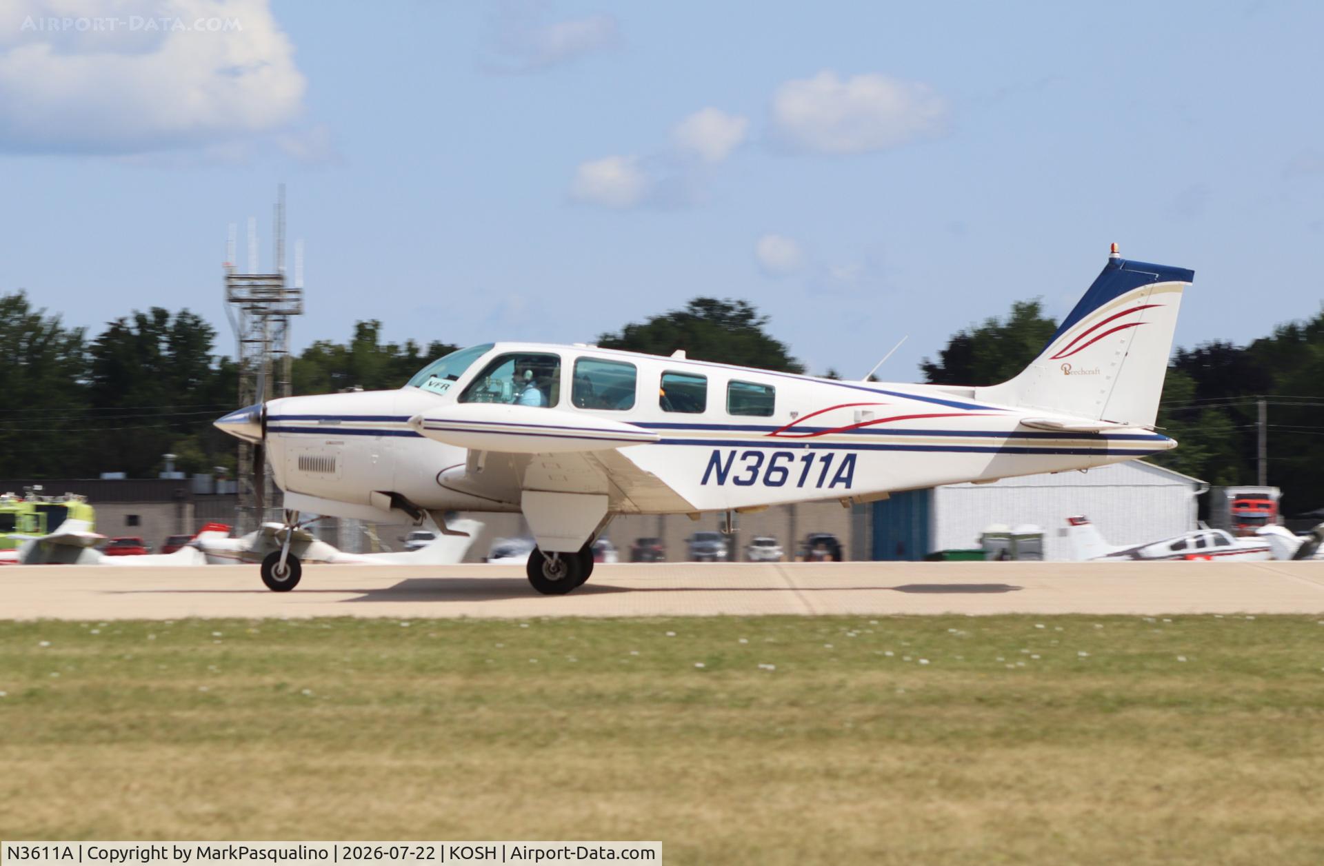 Aircraft N3611A, 1979 Beech A36 Bonanza 36, c/n E-1472, Beech A36, at KOSH, photo by MarkPasqualino