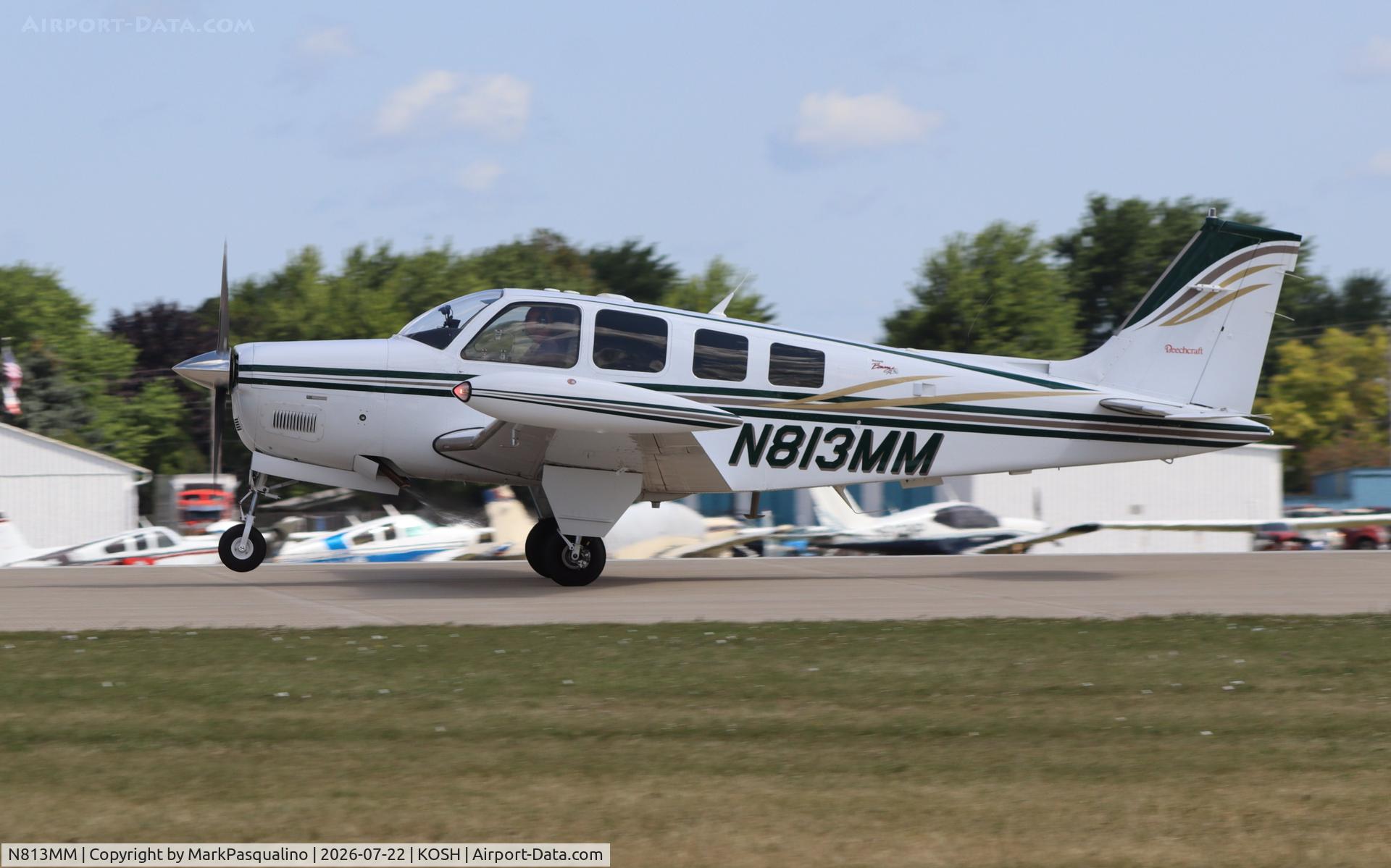 Aircraft N813MM, 2000 Raytheon Aircraft Company A36 Bonanza, c/n E-3342, Beech A36, at KOSH, photo by MarkPasqualino