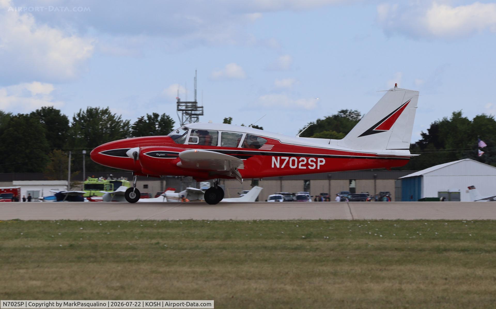 Aircraft N702SP, 1963 Piper PA-23-250, c/n 27-2336, Piper PA-23-250, at KOSH, photo by MarkPasqualino