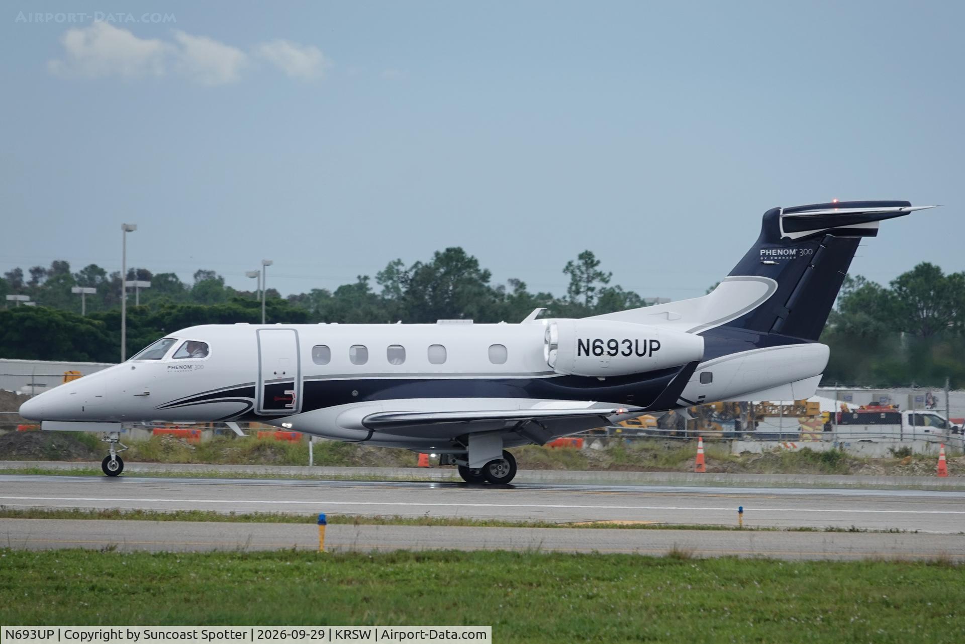 Aircraft N693UP, 2017 Embraer EMB-505 Phenom 300, c/n 50500409, Wheels Up 693 departs Southwest Florida International Airport enroute to Columbia Metropolitan Airport, at KRSW, photo by Suncoast Spotter