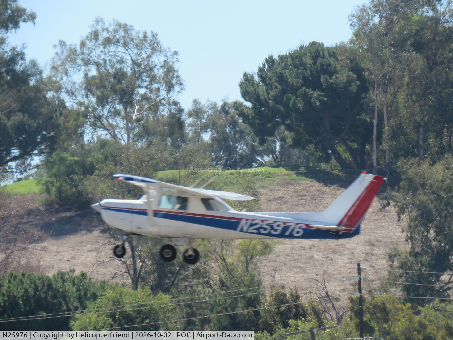 Aircraft N25976, 1977 Cessna 152, c/n 15280890, Lifting off from 26R, at POC, photo by Helicopterfriend