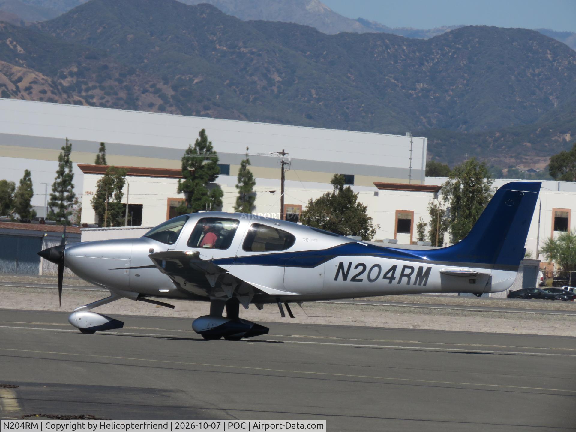 Aircraft N204RM, 2015 Cirrus SR20, c/n 2295, Moving away from fuel pumps, at POC, photo by Helicopterfriend