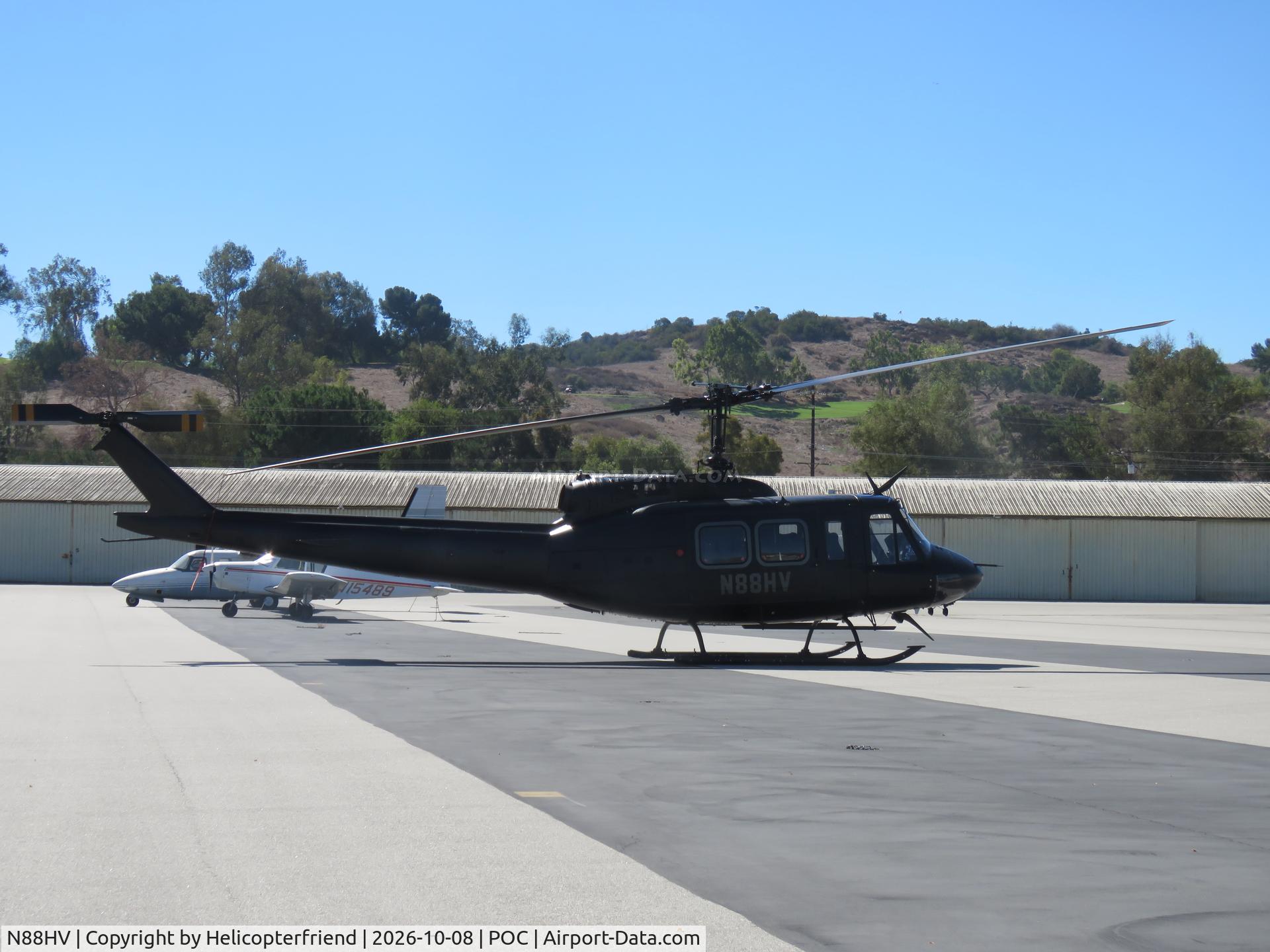 Aircraft N88HV, 1980 Bell 212S Eagle Single, c/n 31118, Parked in center transit, at POC, photo by Helicopterfriend