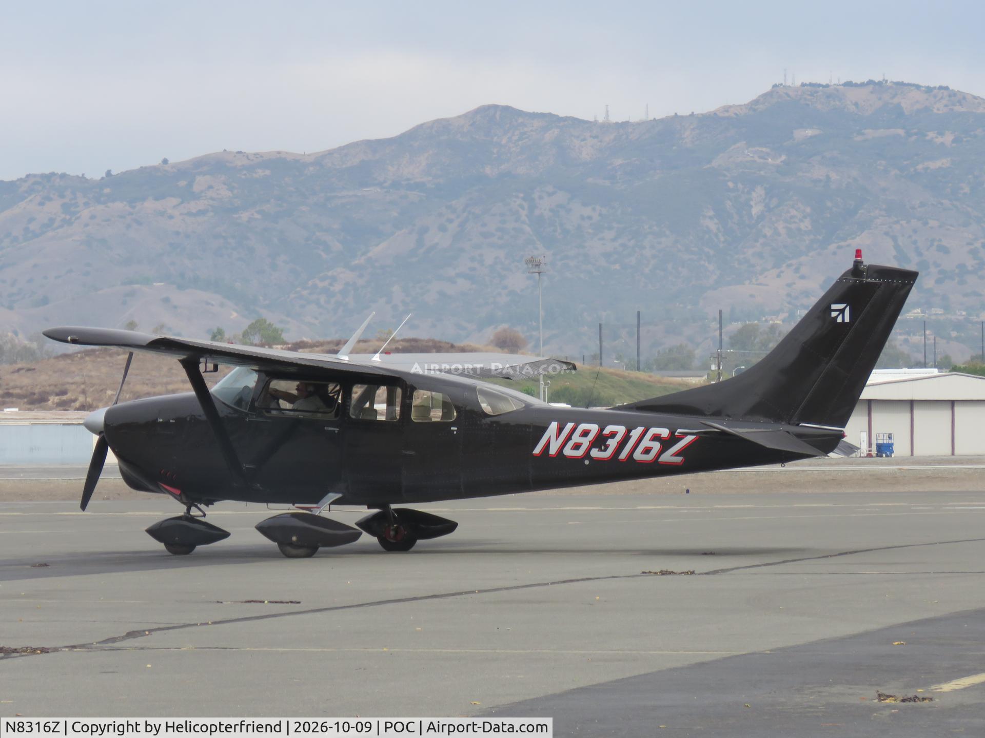 Aircraft N8316Z, 1963 Cessna 210-5(205), c/n 205-0316, Parked in transit parking, at POC, photo by Helicopterfriend