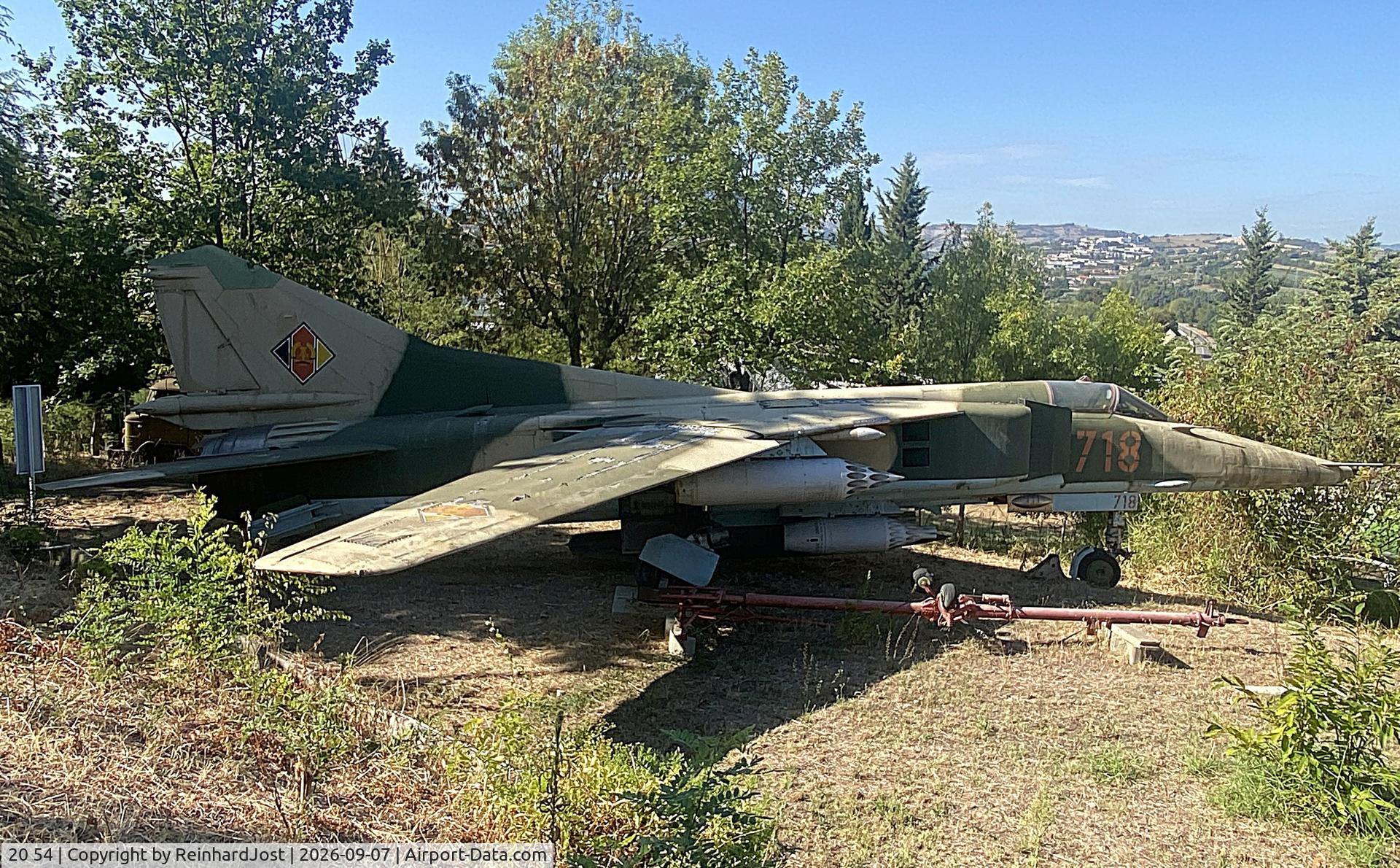 Aircraft 20 54, Mikoyan-Gurevich MiG-23BN, c/n 0393215729, Flogger-H as NVA (Nationale Volksarmee - National Peoples Army, the East German Air Force of the cold war area) 718 at Parco Tematico dell'Aviazione at La Cerbaiola near Rimini, Italy, photo by ReinhardJost