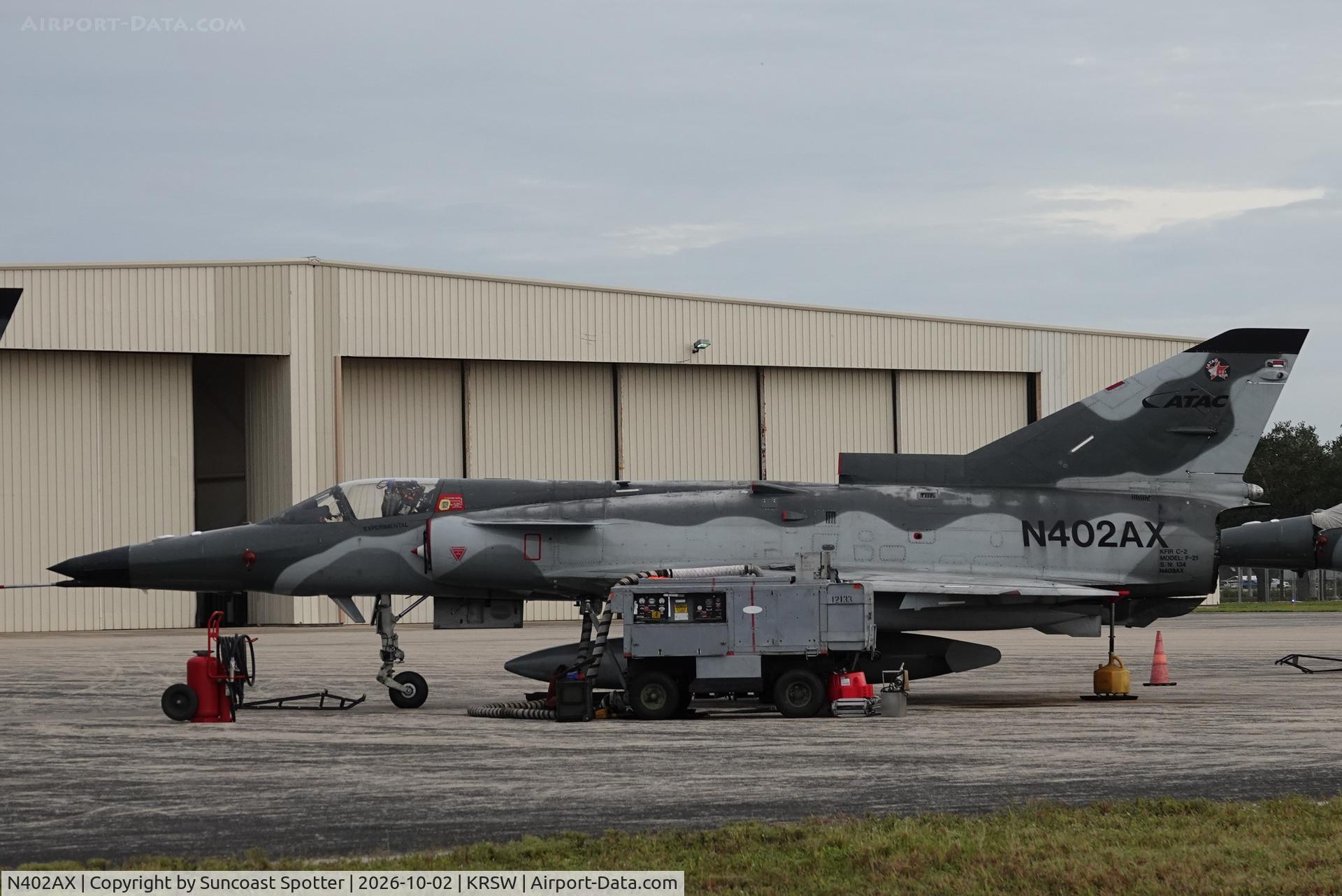 Aircraft N402AX, 1980 Israel Aircraft Industries Kfir C.2, c/n 134, A F-21 Kfir C2 sits on the Private Sky ramp at Southwest Florida International Airport, at KRSW, photo by Suncoast Spotter