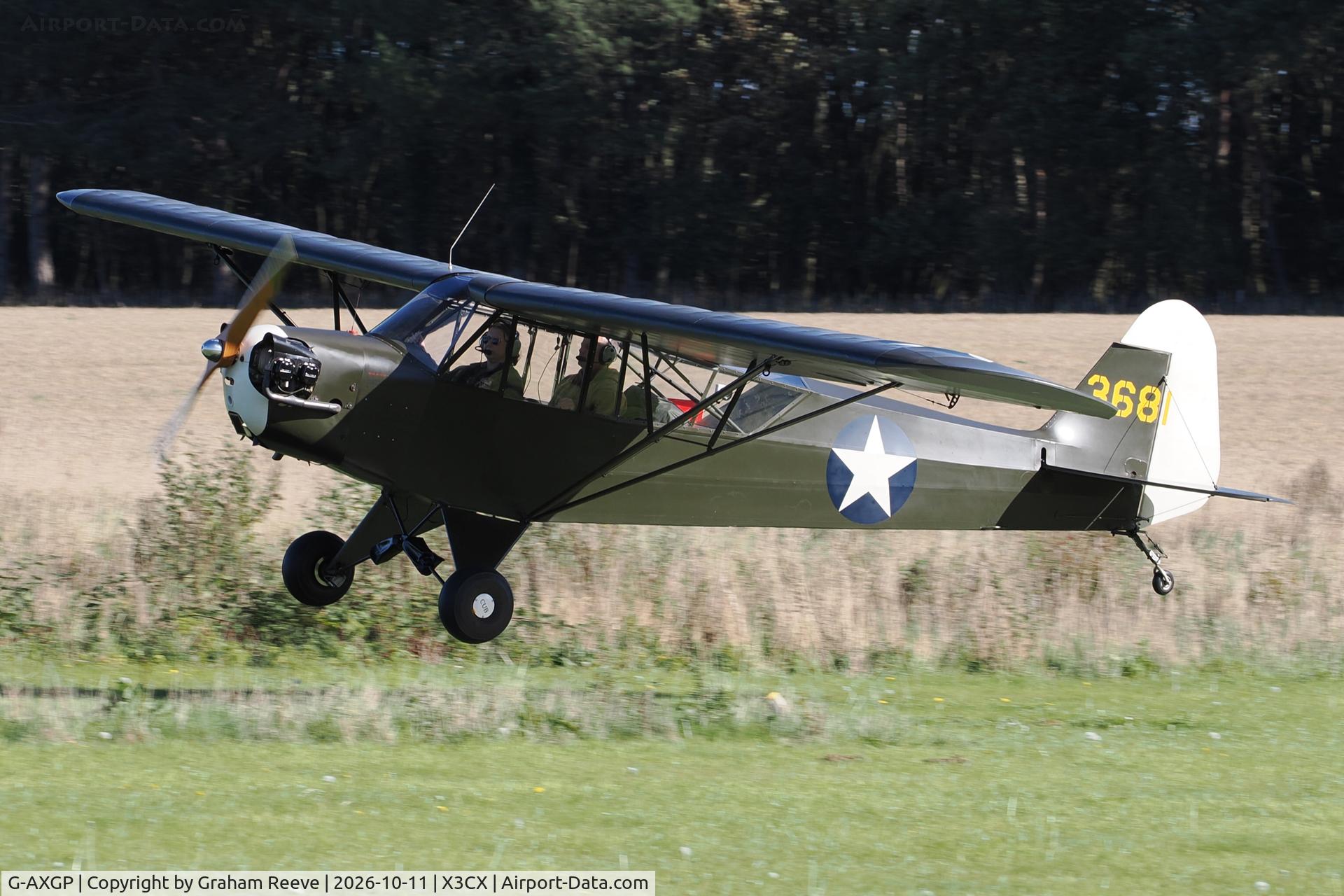 Aircraft G-AXGP, 1942 Piper J3C-90 Cub, c/n 9542, Landing at Northrepps., at X3CX, photo by Graham Reeve