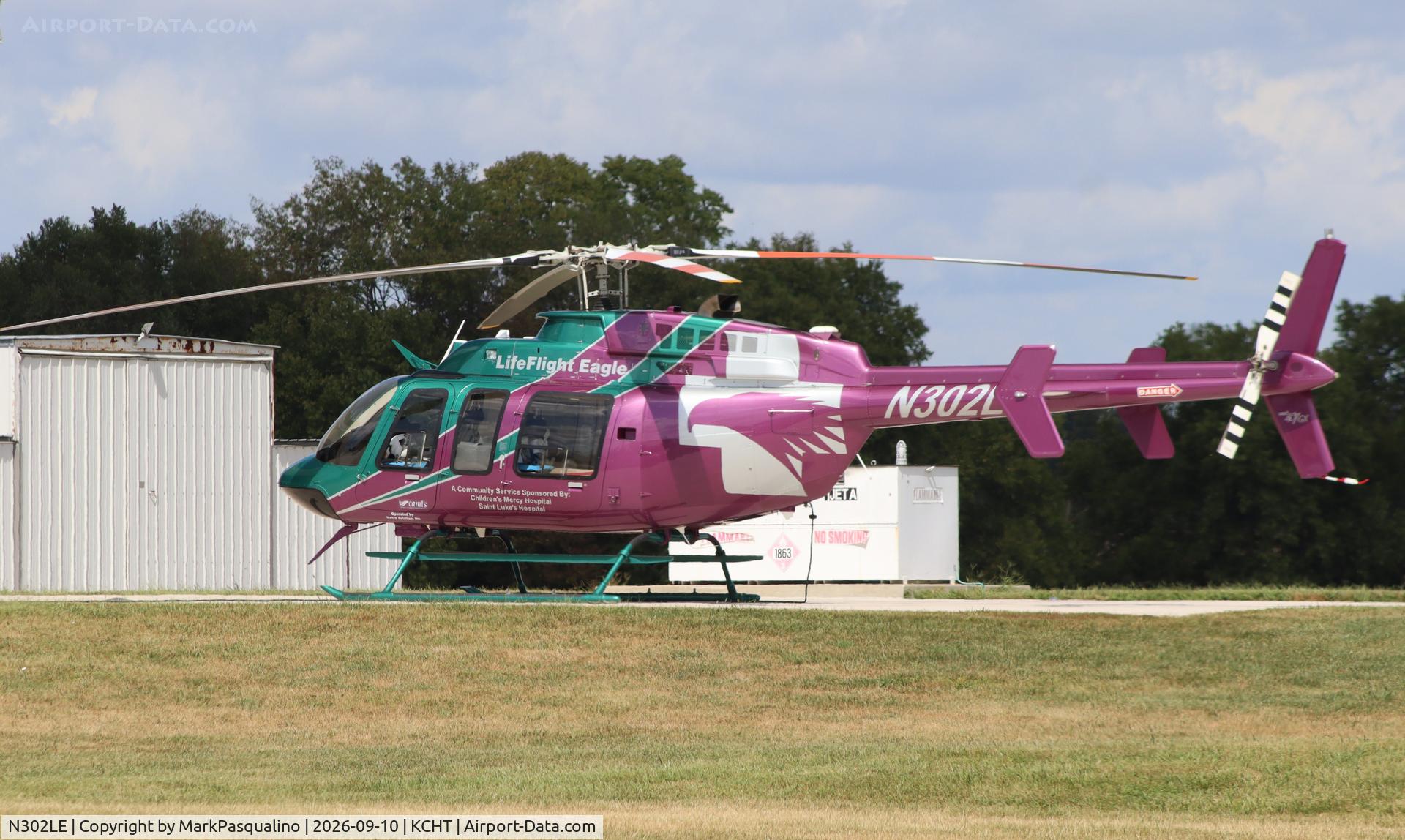Aircraft N302LE, 2013 Bell 407, c/n 54418, Bell 407, at KCHT, photo by MarkPasqualino