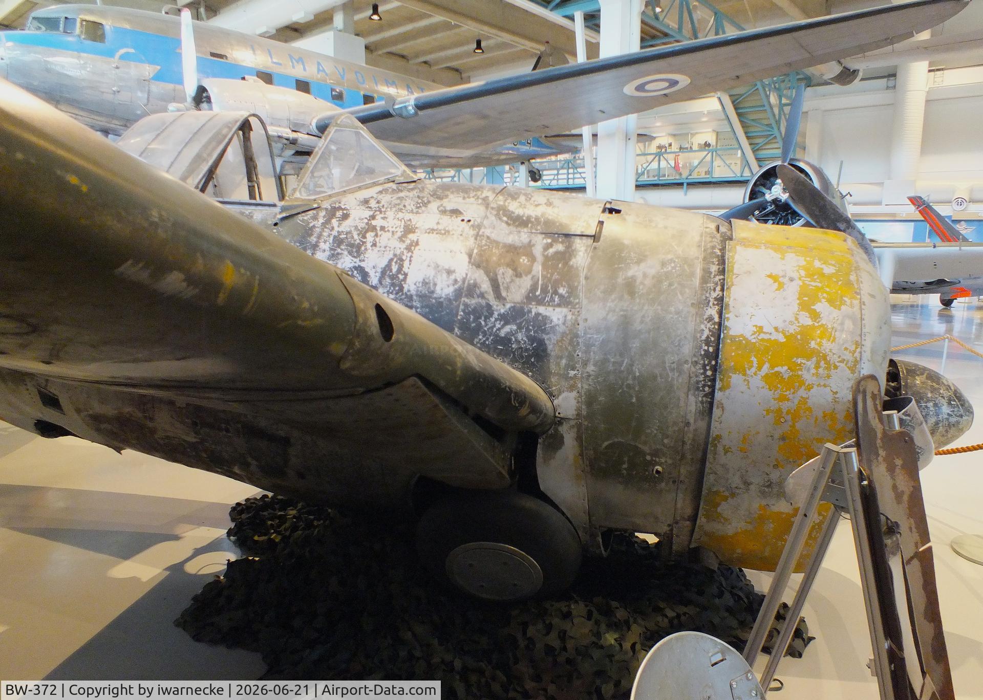 Aircraft BW-372, Brewster B-239 Buffalo, c/n 39, Brewster B-239 Buffalo (displayed unrestored) at the Suomen Ilmavoimamuseo (Finnish Air Force Museum, formerly known as Keski-Suomen Ilmailumuseo / Aviation Museum of Central Finland), Jyväskylä-Tikkakoski, photo by iwarnecke