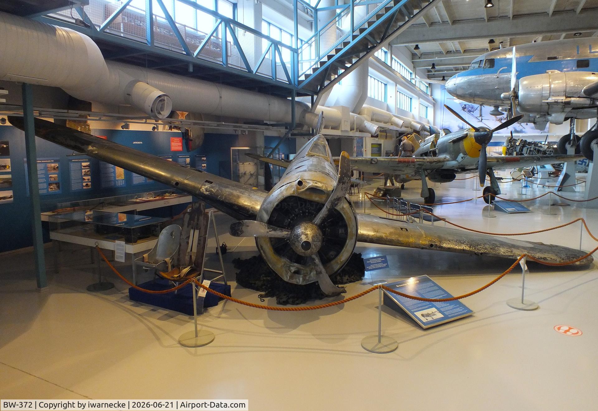 Aircraft BW-372, Brewster B-239 Buffalo, c/n 39, Brewster B-239 Buffalo (displayed unrestored) at the Suomen Ilmavoimamuseo (Finnish Air Force Museum, formerly known as Keski-Suomen Ilmailumuseo / Aviation Museum of Central Finland), Jyväskylä-Tikkakoski, photo by iwarnecke