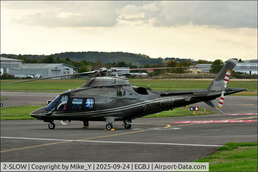 Aircraft 2-SLOW, AGUSTA A-109S Grand, c/n 022101, Agusta A-109S Grand (Previously D-HSKM) at Gloucestershire Airport, at EGBJ, photo by Mike_Y