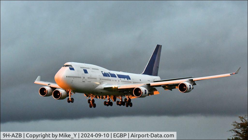 Aircraft 9H-AZB, 2003 Boeing 747-428, c/n 32869 l/n 1327, 2003 Boeing 747-428 making a sunset arrival at Cotswold Airport to be scrapped, at EGBP, photo by Mike_Y