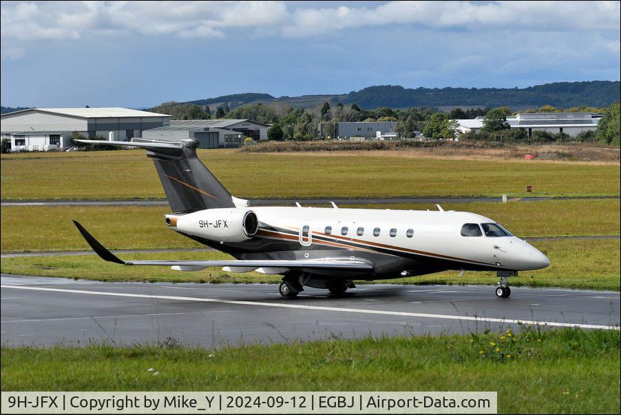 Aircraft 9H-JFX, 2021 Embraer EMB-550 Praetor 600, c/n 55020151, 2021 Embraer EMB-550 Praetor 600 preparing to depart Gloucestershire Airport, at EGBJ, photo by Mike_Y