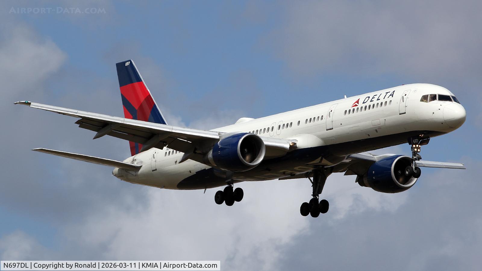 Aircraft N697DL, 1999 Boeing 757-232, c/n 30318, at mia, at KMIA, photo by Ronald