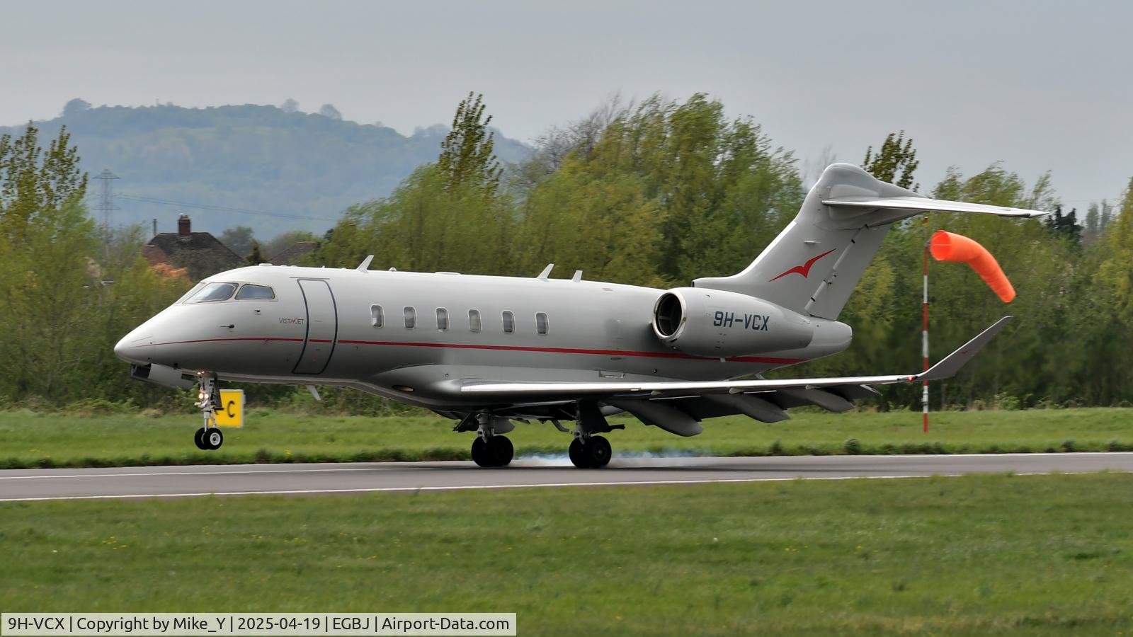 Aircraft 9H-VCX, 2015 Bombardier Challenger 350 (BD-100-1A10), c/n 20576, 2015 Bombardier Challenger 350 touching down at Gloucestershire Airport, at EGBJ, photo by Mike_Y