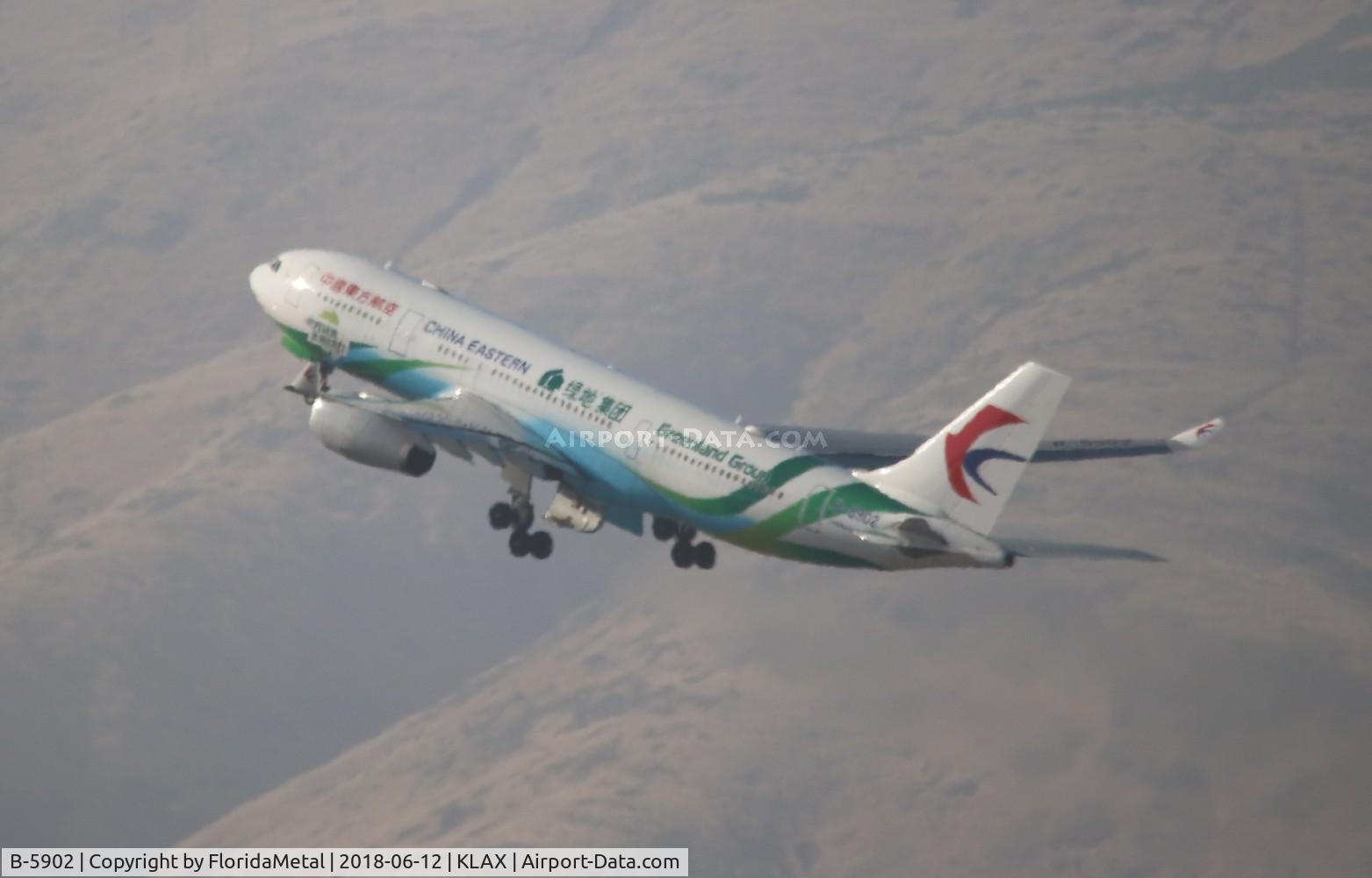 Aircraft B-5902, 2012 Airbus A330-243, c/n 1324, CES A332 zx, at KLAX, photo by FloridaMetal
