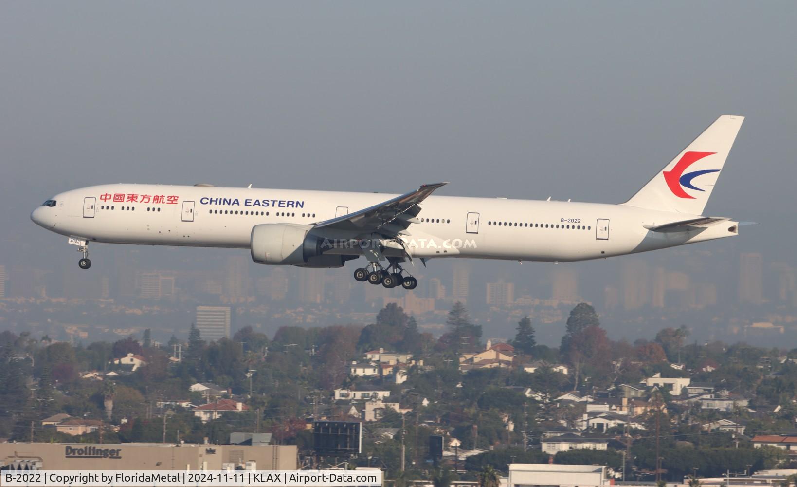 Aircraft B-2022, 2015 Boeing 777-39P/ER, c/n 43274 l/n 1321, CES 773 zx pvg-lax, at KLAX, photo by FloridaMetal