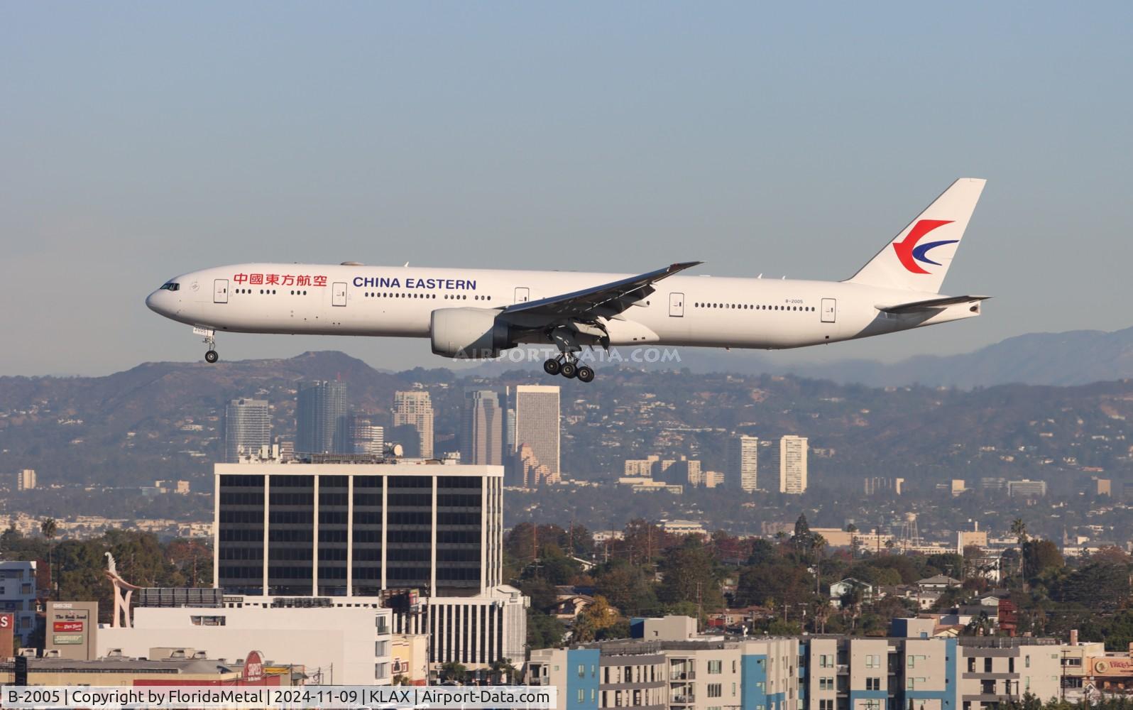 Aircraft B-2005, 2014 Boeing 777-39P/ER, c/n 43271 l/n 1259, CES 773 zx pvg-lax, at KLAX, photo by FloridaMetal