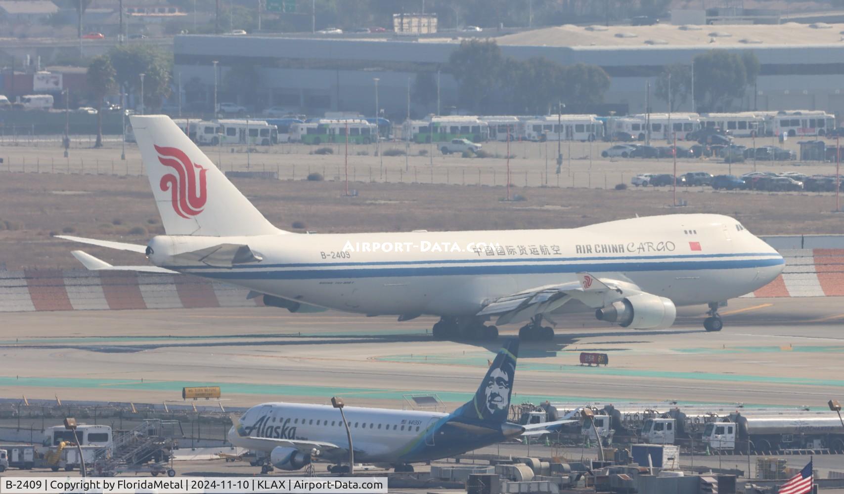 Aircraft B-2409, Boeing 747-412F/SCD, c/n 26560, CAO 747-400F zx lax-she, at KLAX, photo by FloridaMetal
