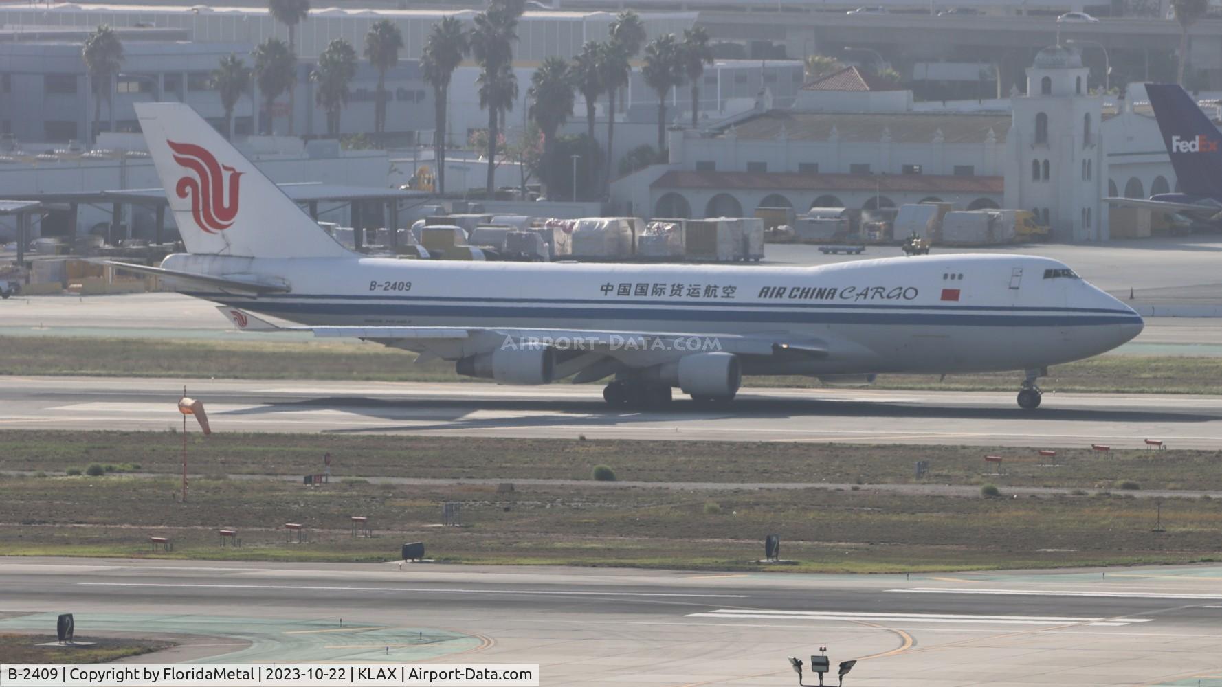 Aircraft B-2409, Boeing 747-412F/SCD, c/n 26560, CAO 747-400F zx lax-pvg, at KLAX, photo by FloridaMetal