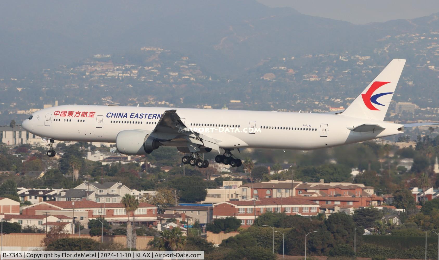 Aircraft B-7343, 2016 Boeing 777-39P/ER, c/n 43277 l/n 1373, CES 773 zx pvg-lax, at KLAX, photo by FloridaMetal