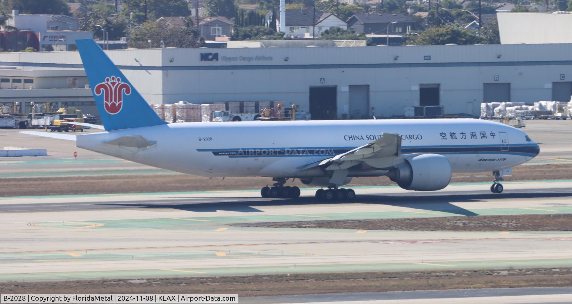 Aircraft B-2028, 2015 Boeing 777-F1B, c/n 41637 l/n 1318, CSN 77L zx lax-pvg, at KLAX, photo by FloridaMetal