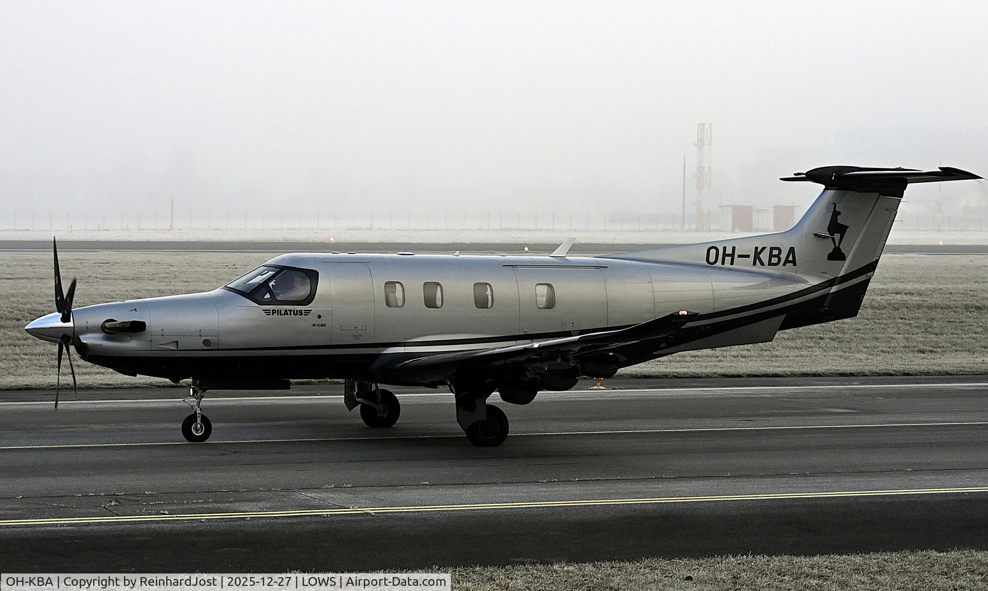 Aircraft OH-KBA, 2020 Pilatus PC-12/47X NGX, c/n 2043, OH-KBA (ex-HB-FQJ) with the logo of the town Kitzbühel on the tail on a foggy day at the Wolfgang Amadeus Mozart Airport, Salzburg, Austria, at LOWS, photo by ReinhardJost