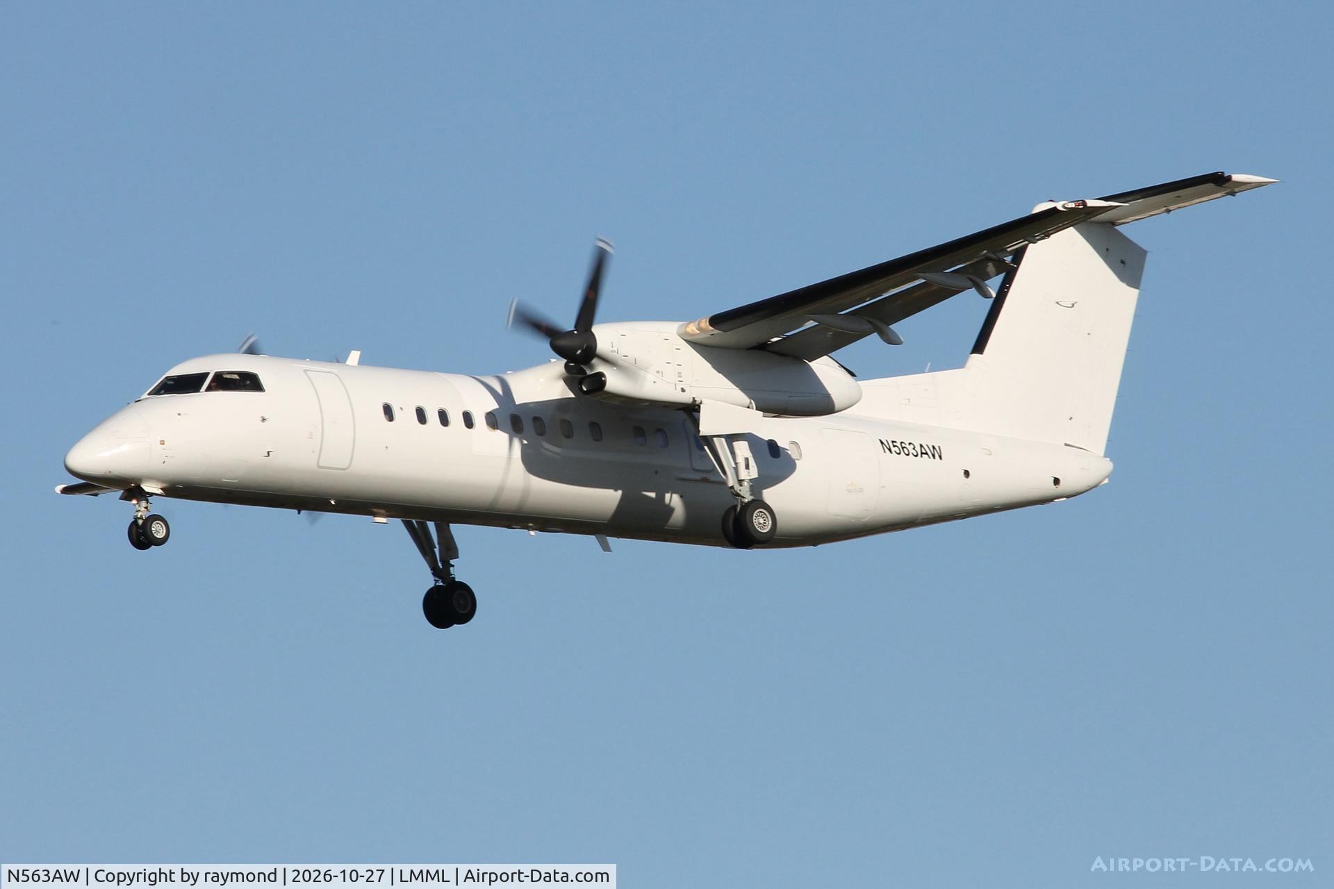 Aircraft N563AW, 2000 De Havilland Canada DHC-8-315Q Dash 8, c/n 563, De Havilland Canada DHC-8-315Q reg N563AW of United States Government approaching RW31 MLA., at LMML, photo by raymond