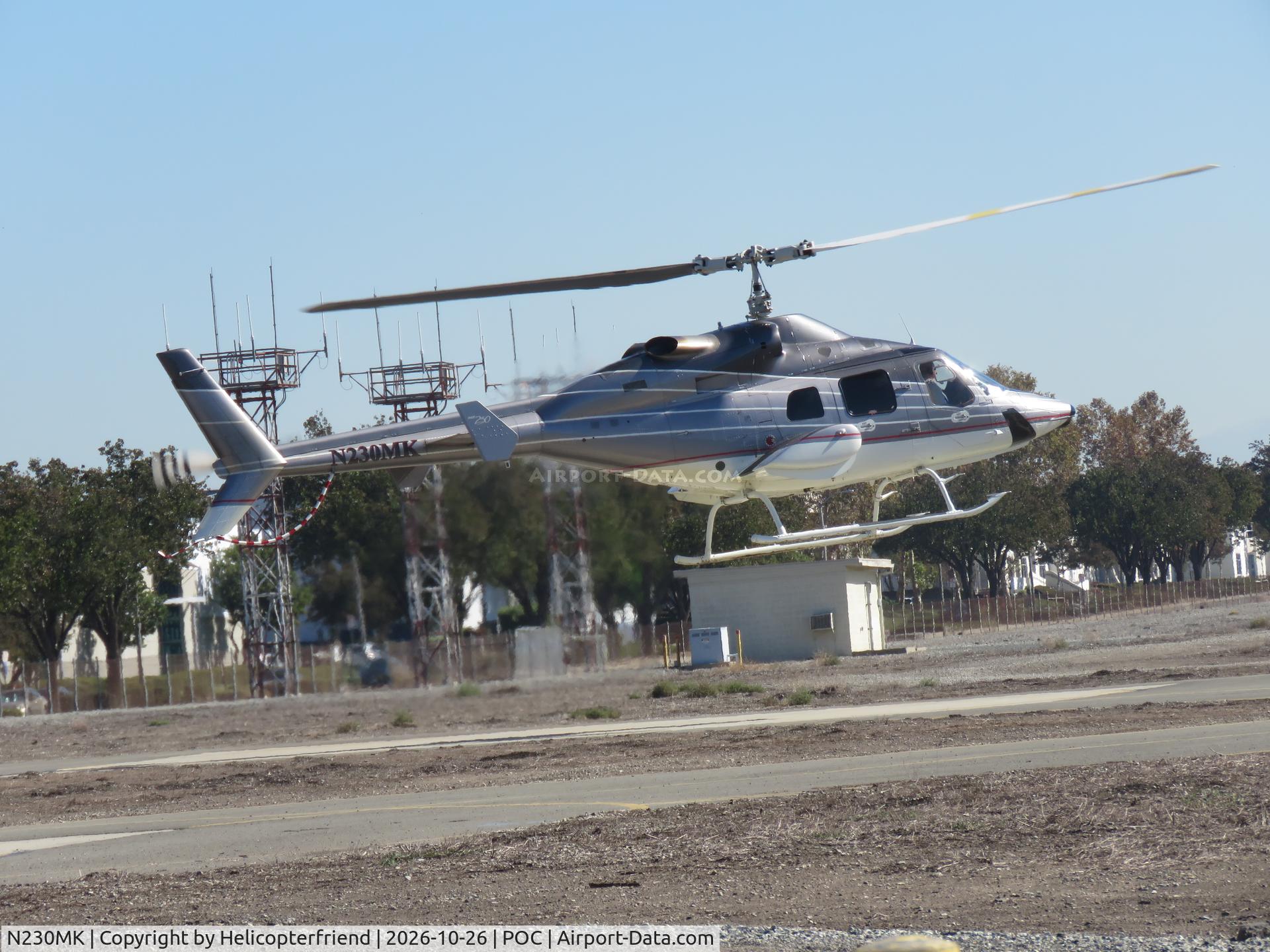 Aircraft N230MK, 1995 Bell 230, c/n 23035, Practicing in-ground-effect hovering north side, at POC, photo by Helicopterfriend