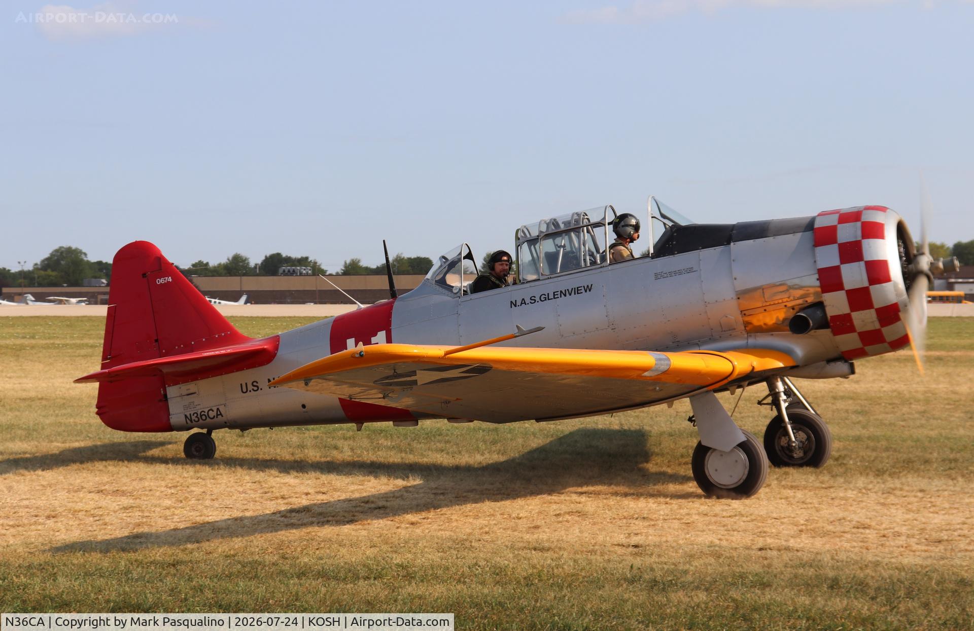 Aircraft N36CA, North American AT-6D Texan, c/n 88-10677, North American AT-6D, at KOSH, photo by Mark Pasqualino