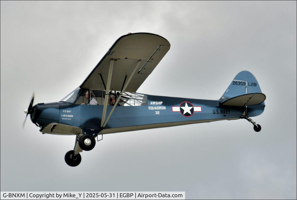 Aircraft G-BNXM, 1954 Piper L-21B Super Cub (PA-18-135), c/n 18-4019, L-21B Super Cub arriving at Cotswold Airport, at EGBP, photo by Mike_Y