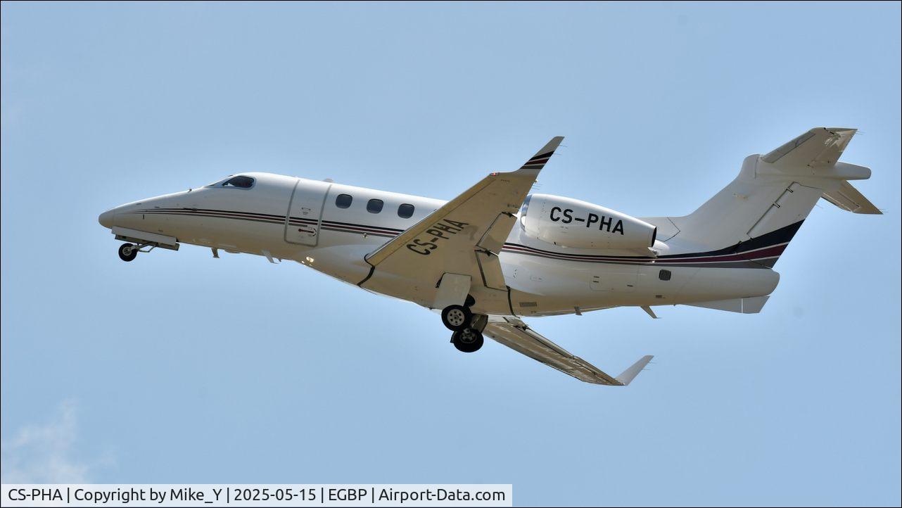 Aircraft CS-PHA, 2014 Embraer EMB-505 Phenom 300, c/n 50500203, Embraer EMB-505 Phenom 300 departing Cotswold Airport, at EGBP, photo by Mike_Y