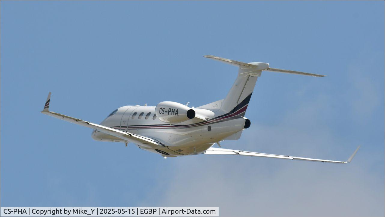 Aircraft CS-PHA, 2014 Embraer EMB-505 Phenom 300, c/n 50500203, Embraer EMB-505 Phenom 300 departing Cotswold Airport, at EGBP, photo by Mike_Y
