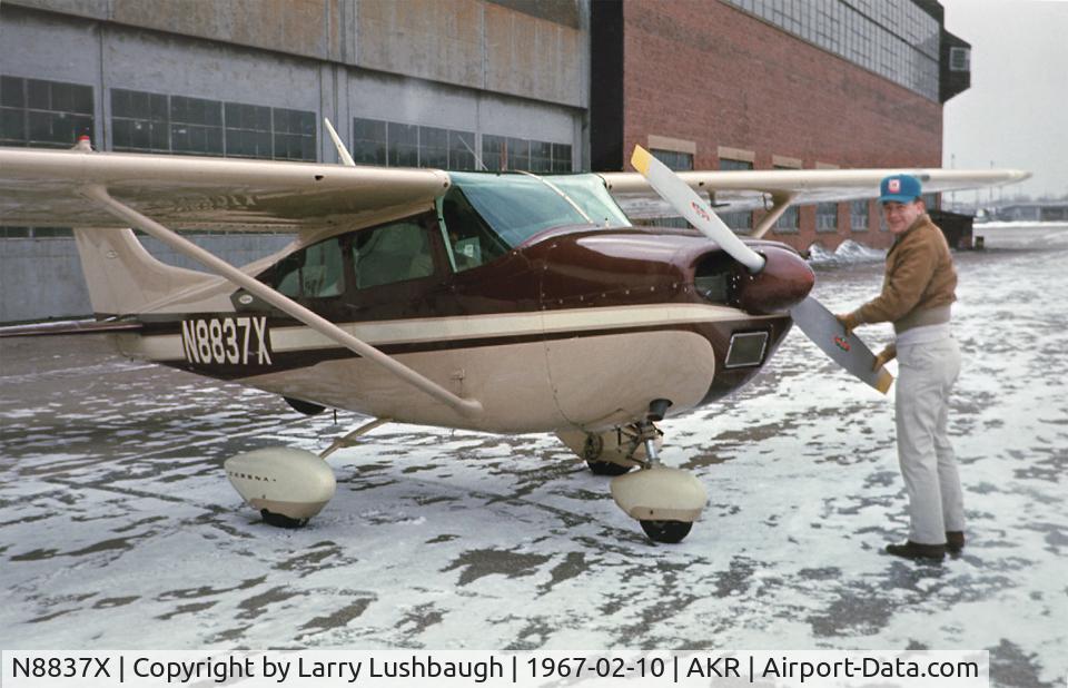 N8837X, 1961 Cessna 182D Skylane C/N 18253237, 37X Preflight at Akron Municipal Airport February 1967