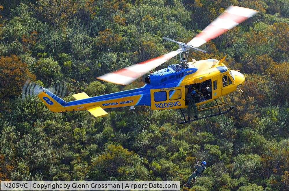 N205VC, 1969 Bell 205A-1 C/N 30066, Copter 8 During A Hoist Maneuver